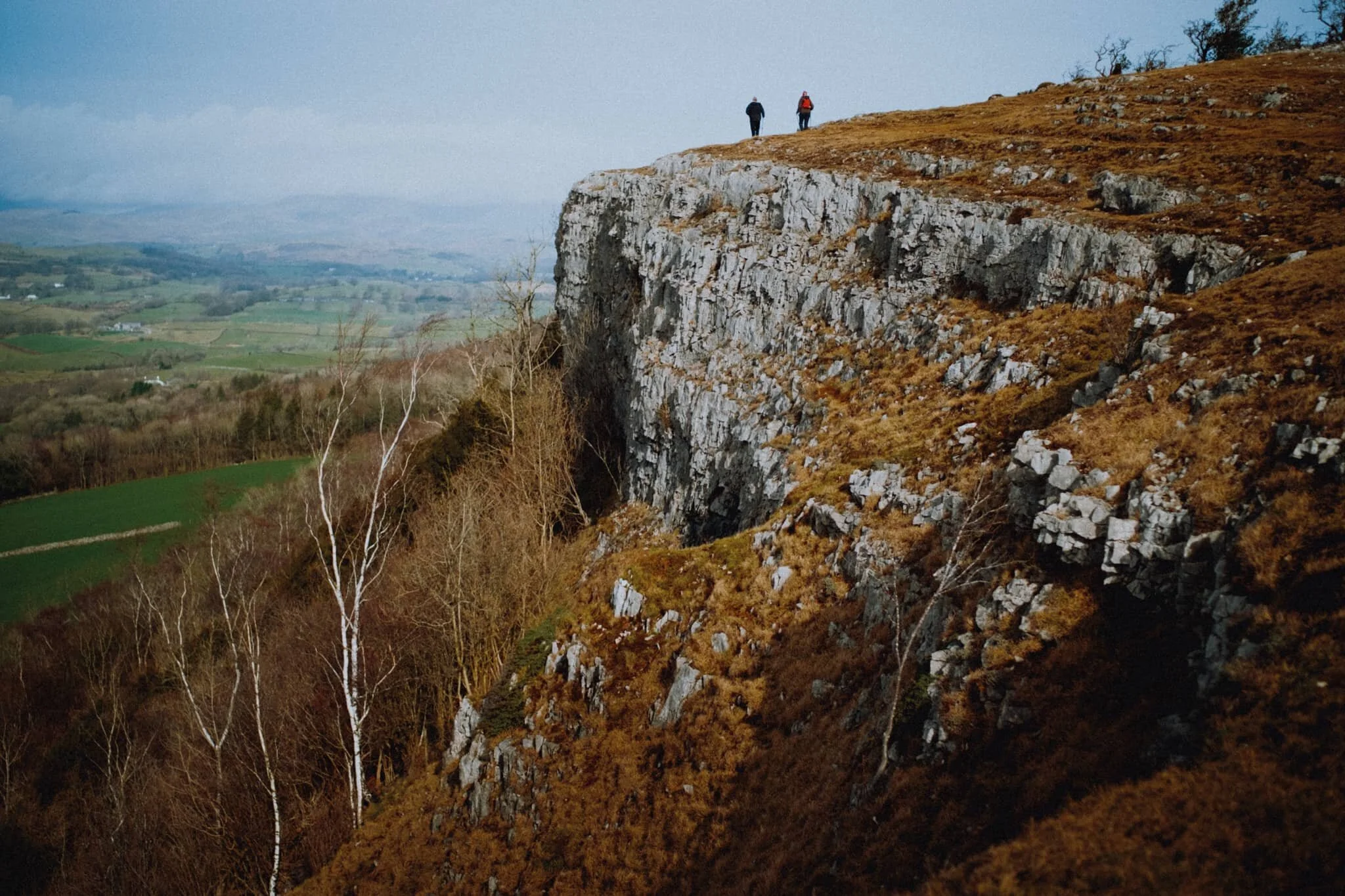 Moving north towards Hodgson’s Leap. I waited for some fellow morning hikers to enter the frame in order to provide perspective of Scout Scar’s cliffs.