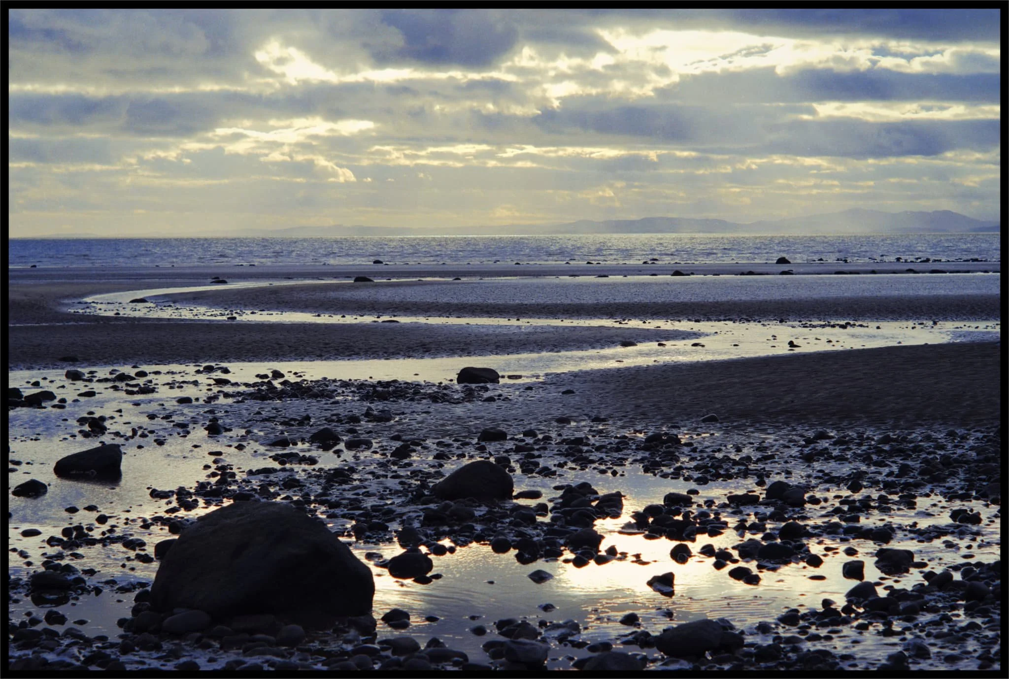  A winding channel snakes out from Allonby towards the bay. 