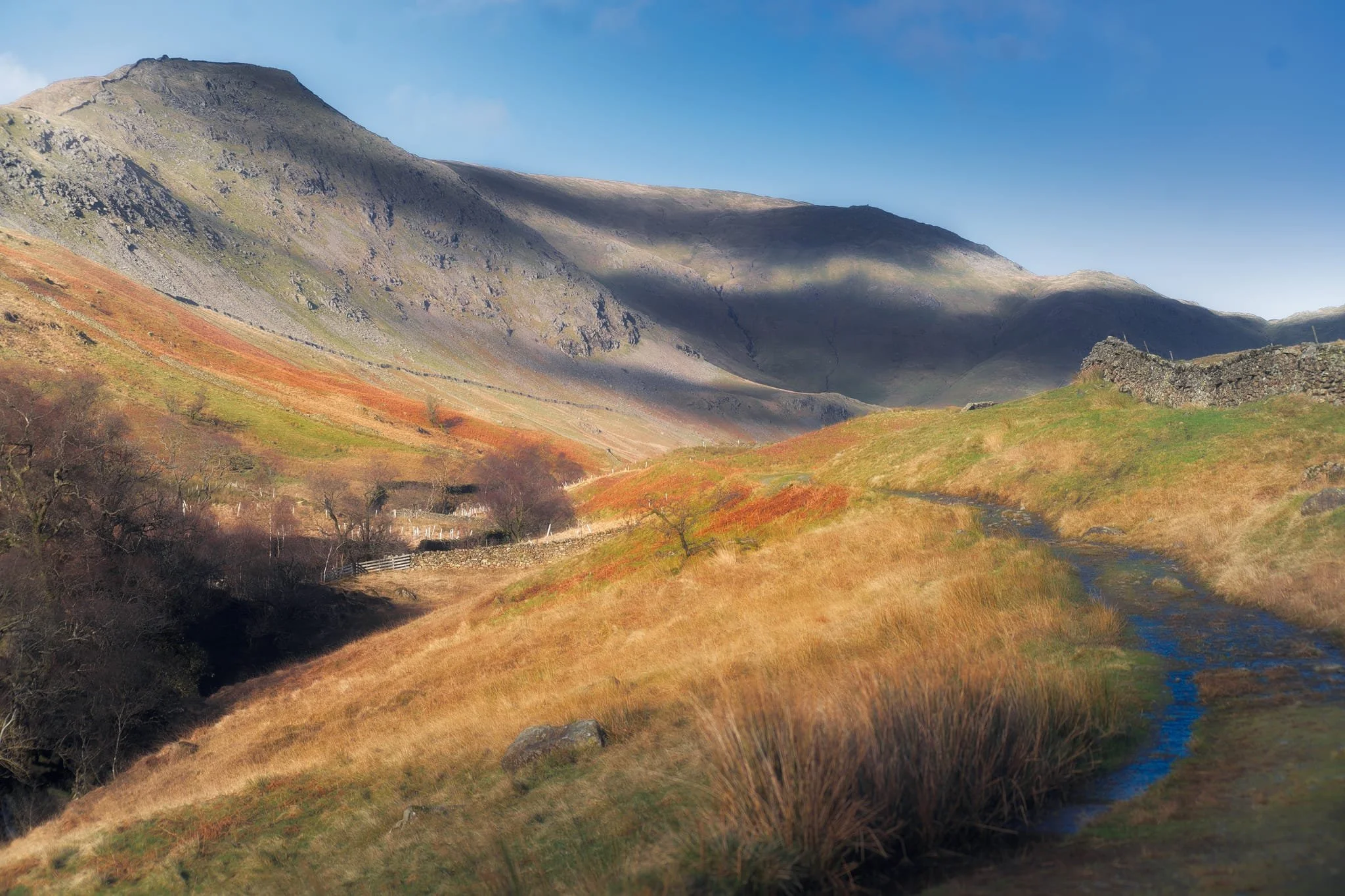 Looking up Scandale, admiring the light beams scanning across the face of High Pike (656 m/2,152 ft).