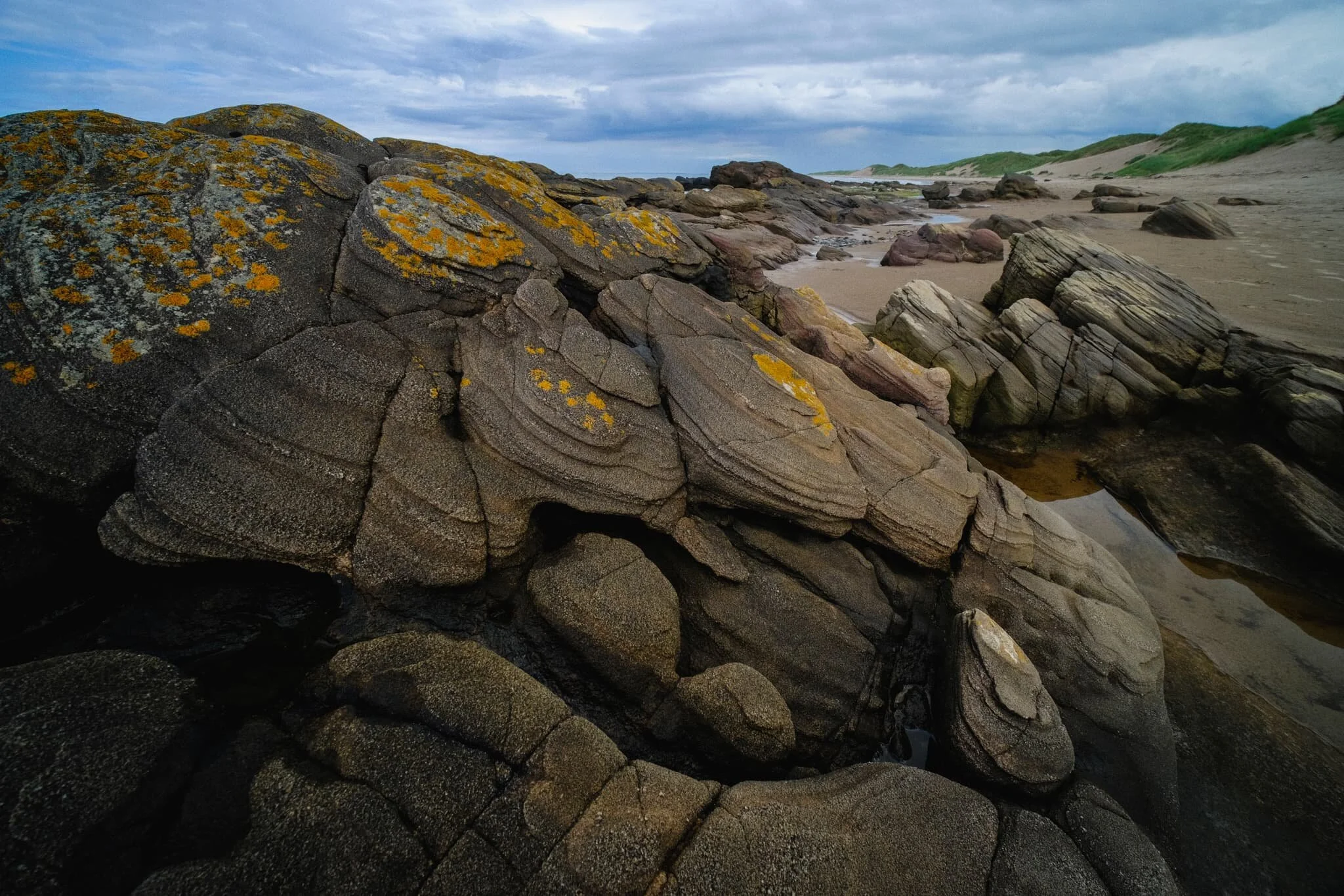  Another fantastical rock formation, seemingly made of &ldquo;scales&rdquo; of discs folding over each other. 