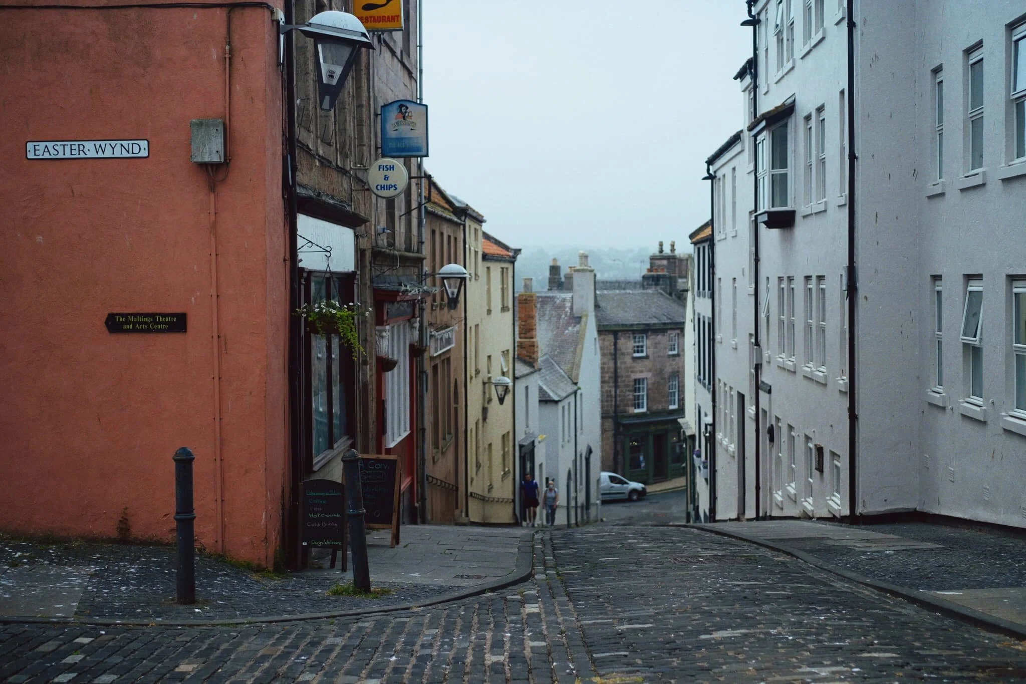 And back down the old cobbled street. 