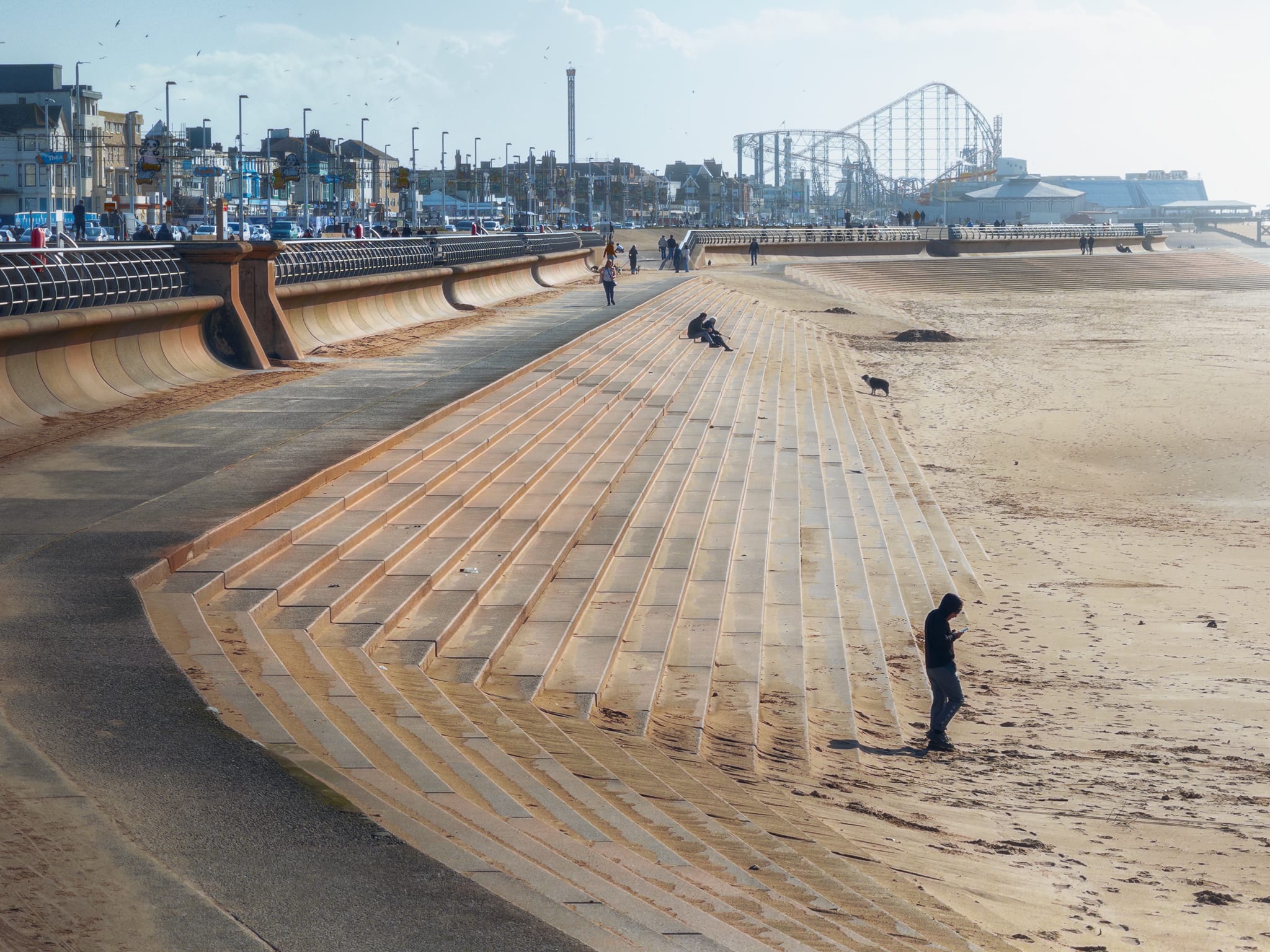 From the Central Pier you can see all the way down the seafront and beach towards the South Pier and the famous silhouette of the rollercoaster named The Big One.