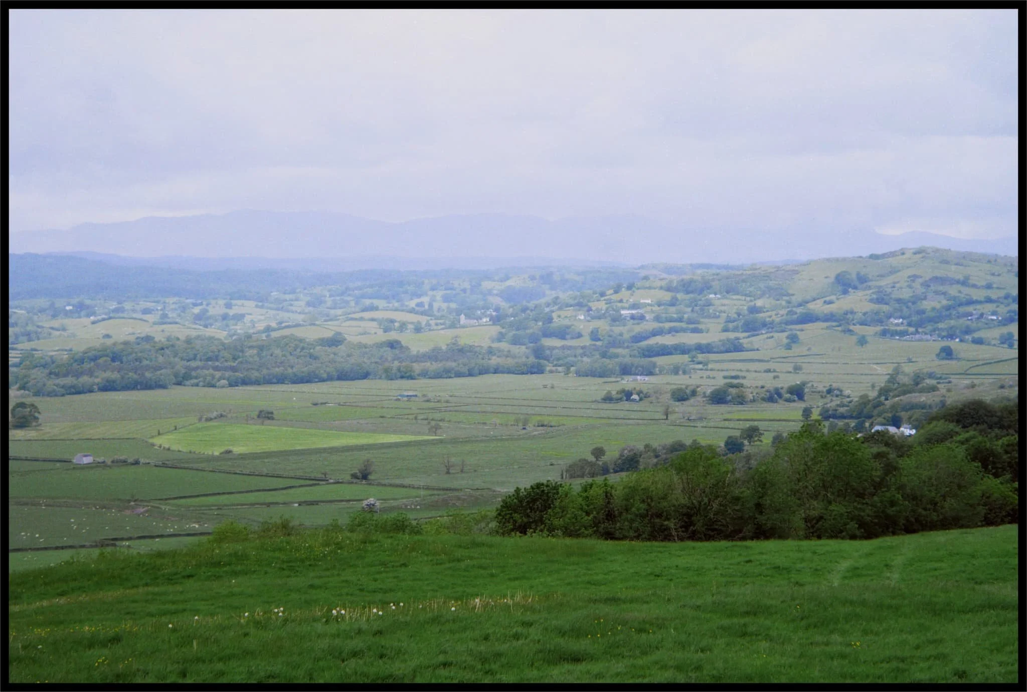  The views from the car park Helsington St. John&rsquo;s church are sublime. All the way across the Lyth Valley to the Lake District fells. 