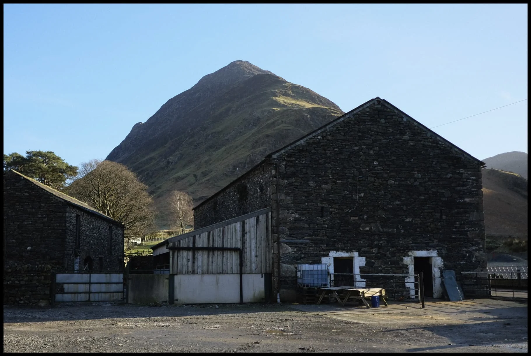  At Gatesgarth Farm, the trail becomes the road around the lake, before eventually rejoining the footpath around the northern shore of Buttermere. Before turning away, I get another look at beautiful Fleetwith Pike. 