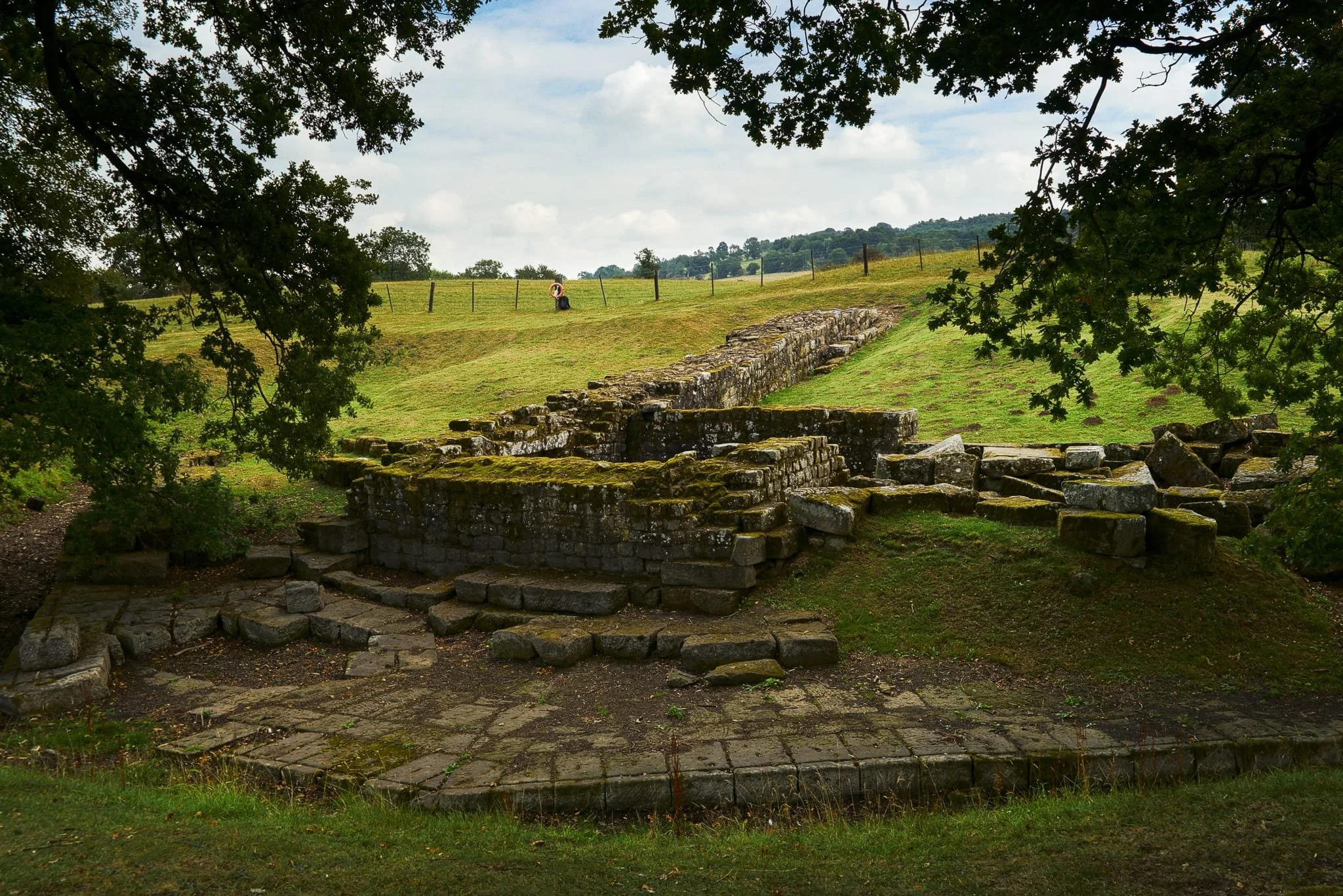  The site in all its summery glory. The river used to come right up to the tower, but in the intervening 2,000 years it&rsquo;s moved west about 60-odd feet, leaving these ruins dry. 