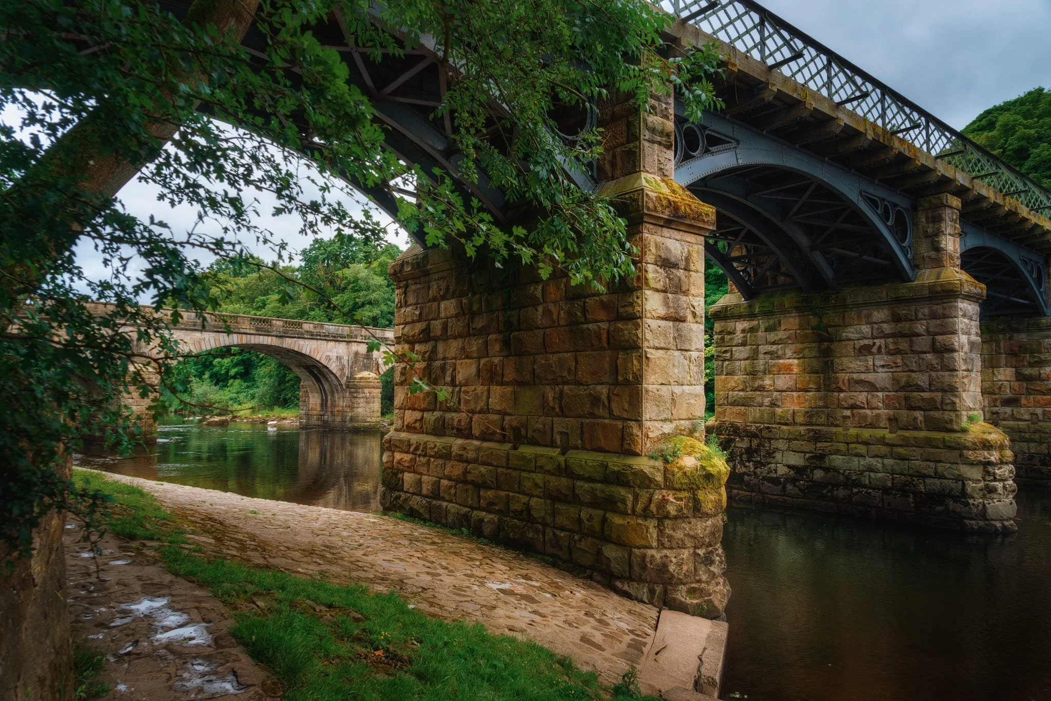 At my lens’ widest point of 24mm, I was able to capture both the Eastern Viaduct and the Caton Lune Bridge. The East Viaduct has five spans and was built in 1849 to carry the “Little” North Western Railway over the river. Like I mentioned earlier, the railway line was fully closed by 1967 and has since been converted into a footpath and cycleway. It underwent major repair and refurbishment in 2013.