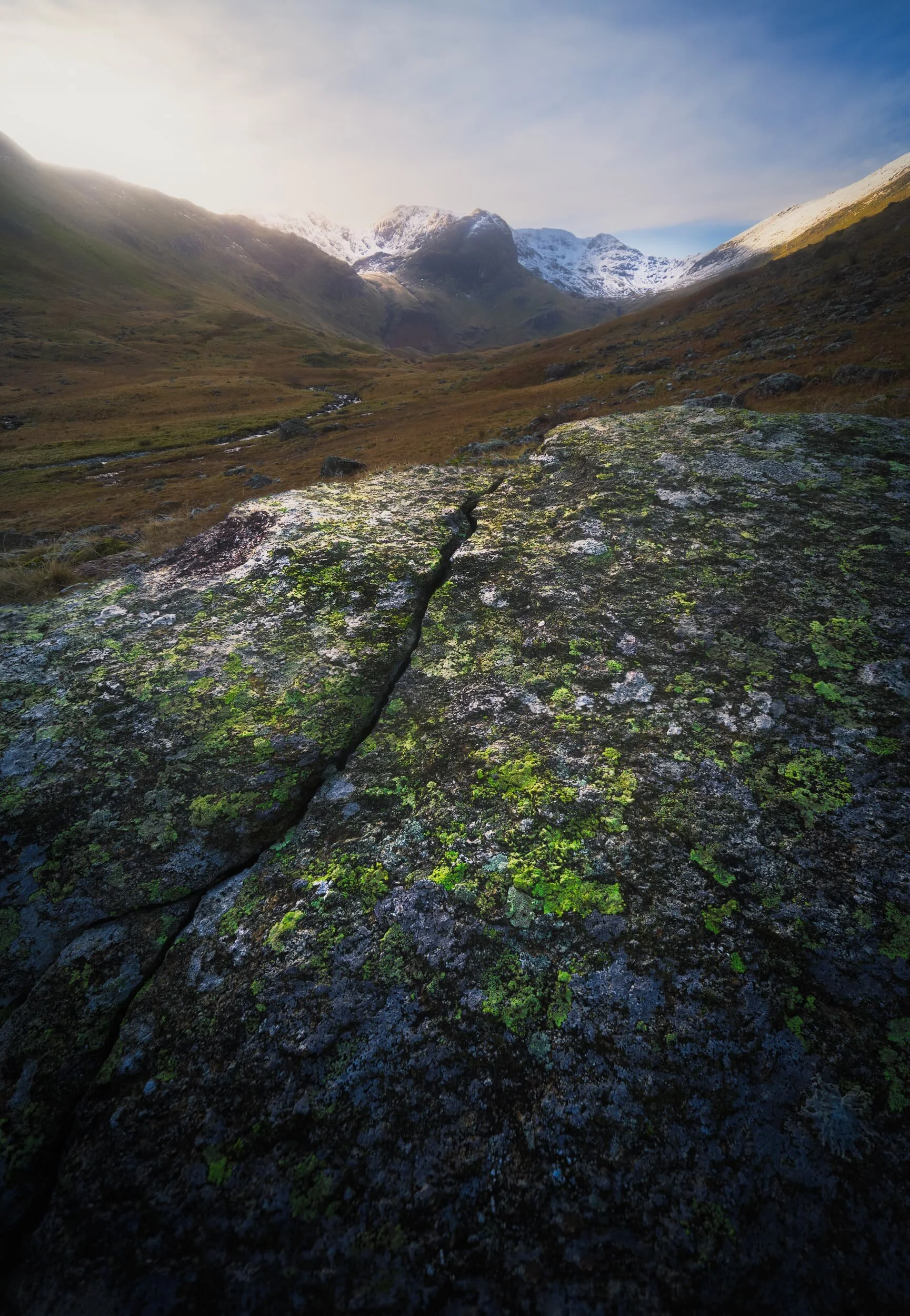  Deepdale is quite a desolate and featureless valley, save for the wonderful crags at its head. There are a few glacial erratics lying about, though, that you can play with compositionally. I found this large boulder with a clear crack running through it, which I used in this focus-stacked photo to point towards Greenhow End. 