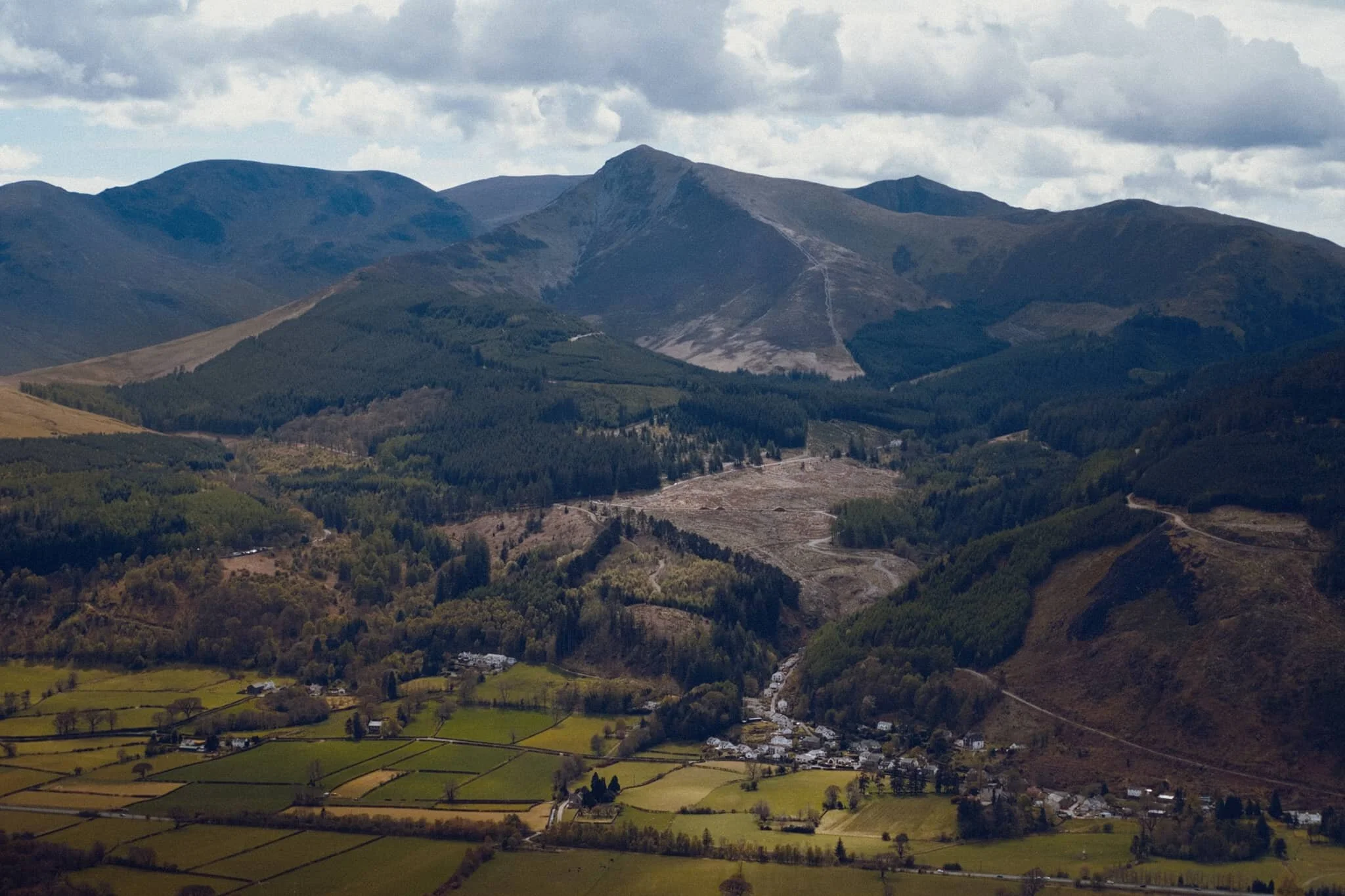 Grisedale Pike (791 m/2,595 ft) catching some lovely light above the Whinlatter Forest.