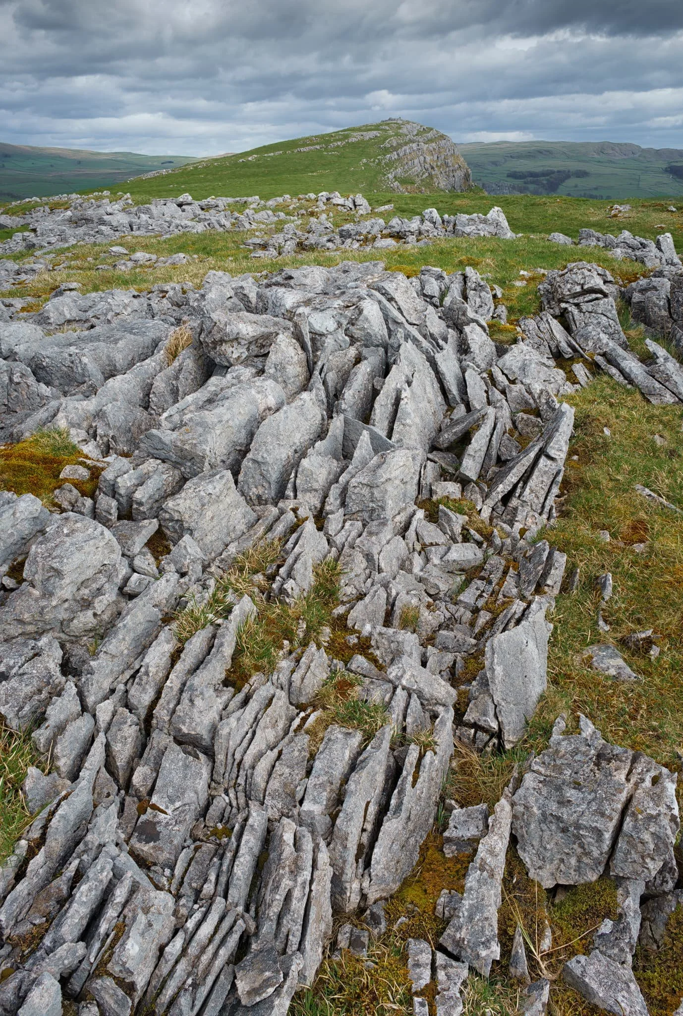 Fin-like clints and grikes of limestone made for a nice leading line towards Smearsett Scar.