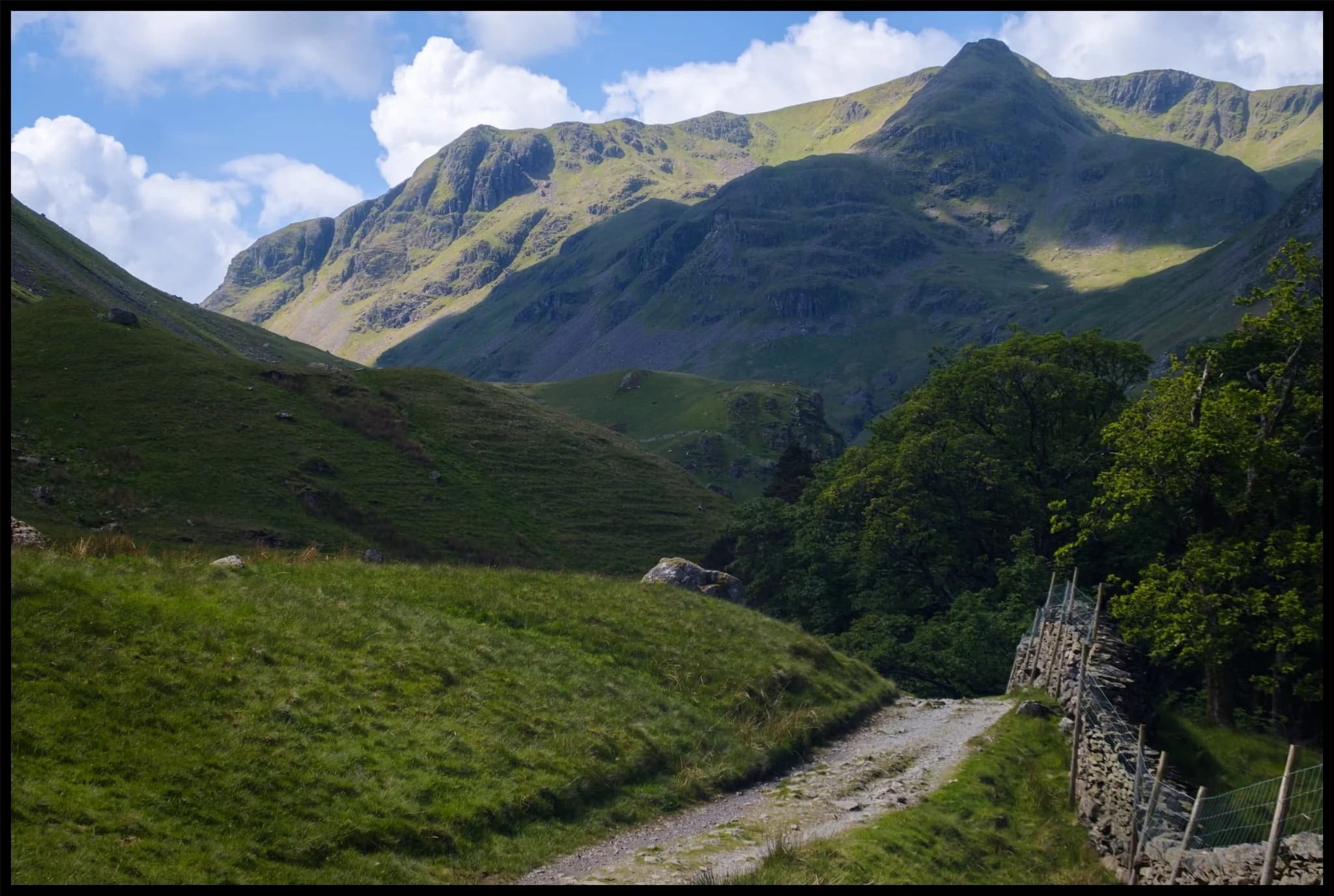  The cloud cover starts to thicken, casting deep shadows across the mountainous landscape. Glorious light conditions.  