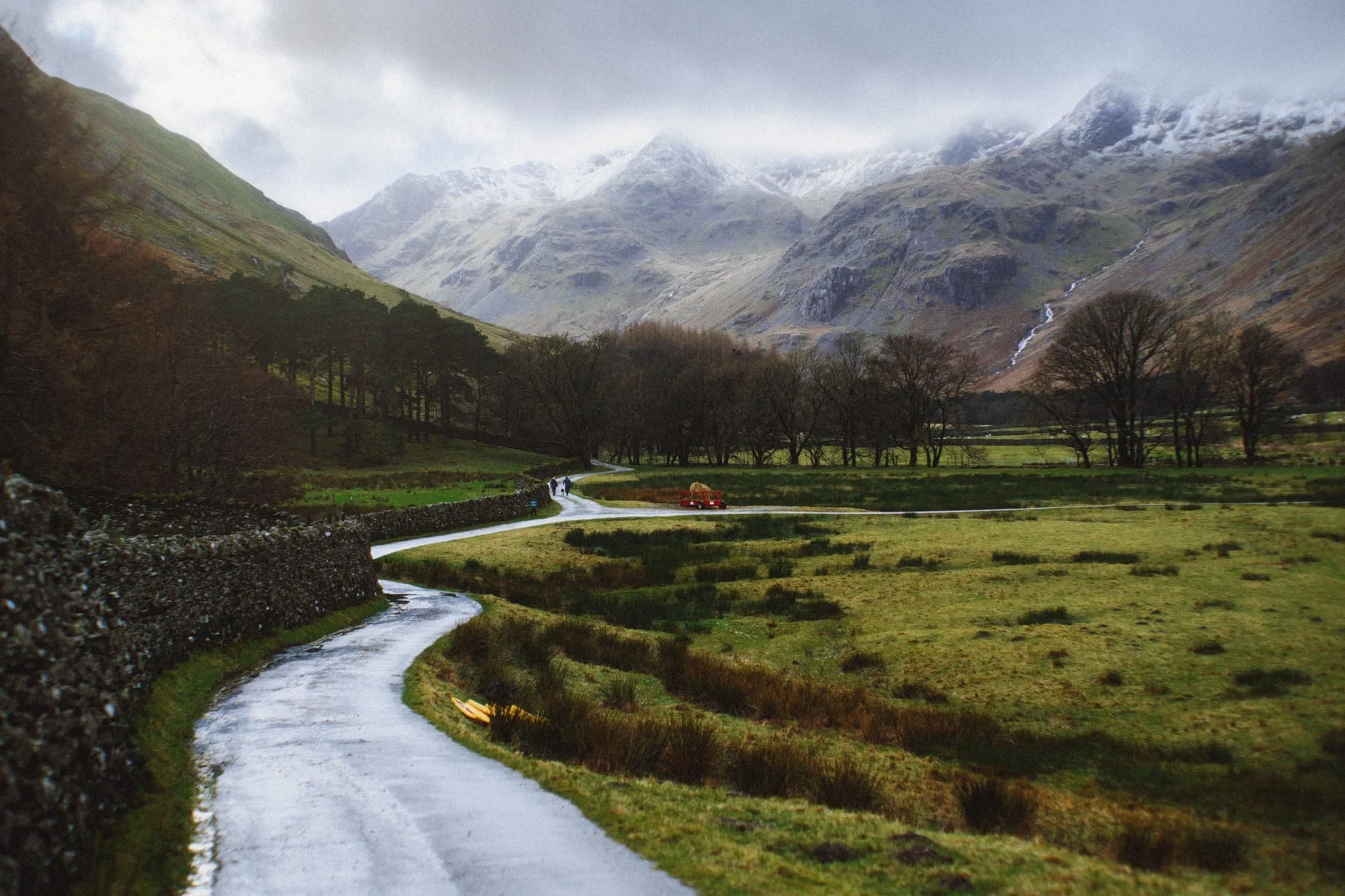  Soon, we near the foot of the valley and the rains were finally done for the afternoon. Look at that mountain backdrop. 