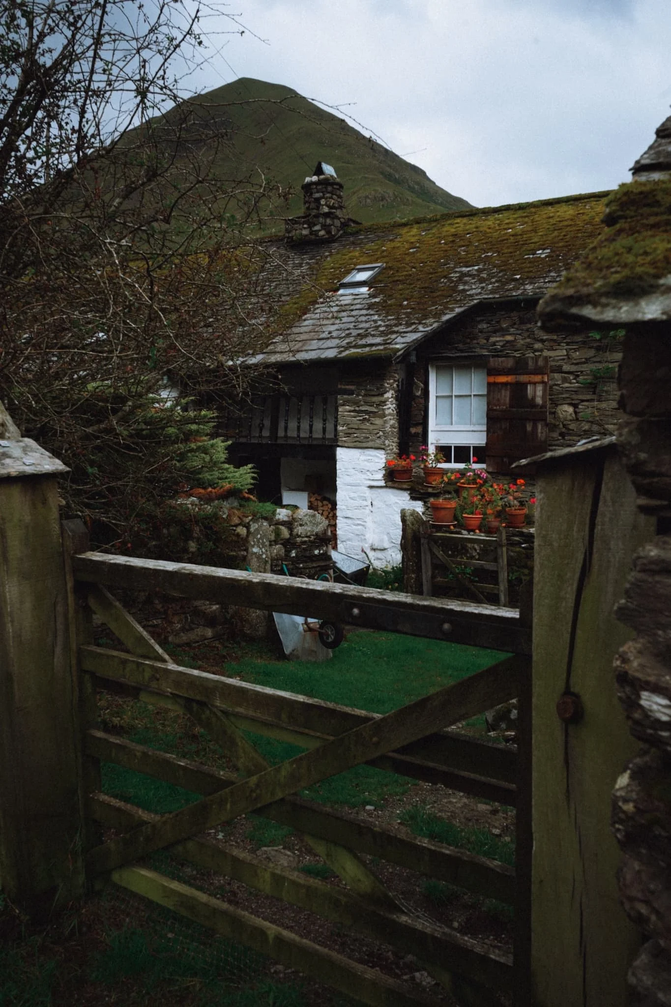  A beautiful scene of one of Hartsop&rsquo;s houses with Hartsop Dodd looming above. 