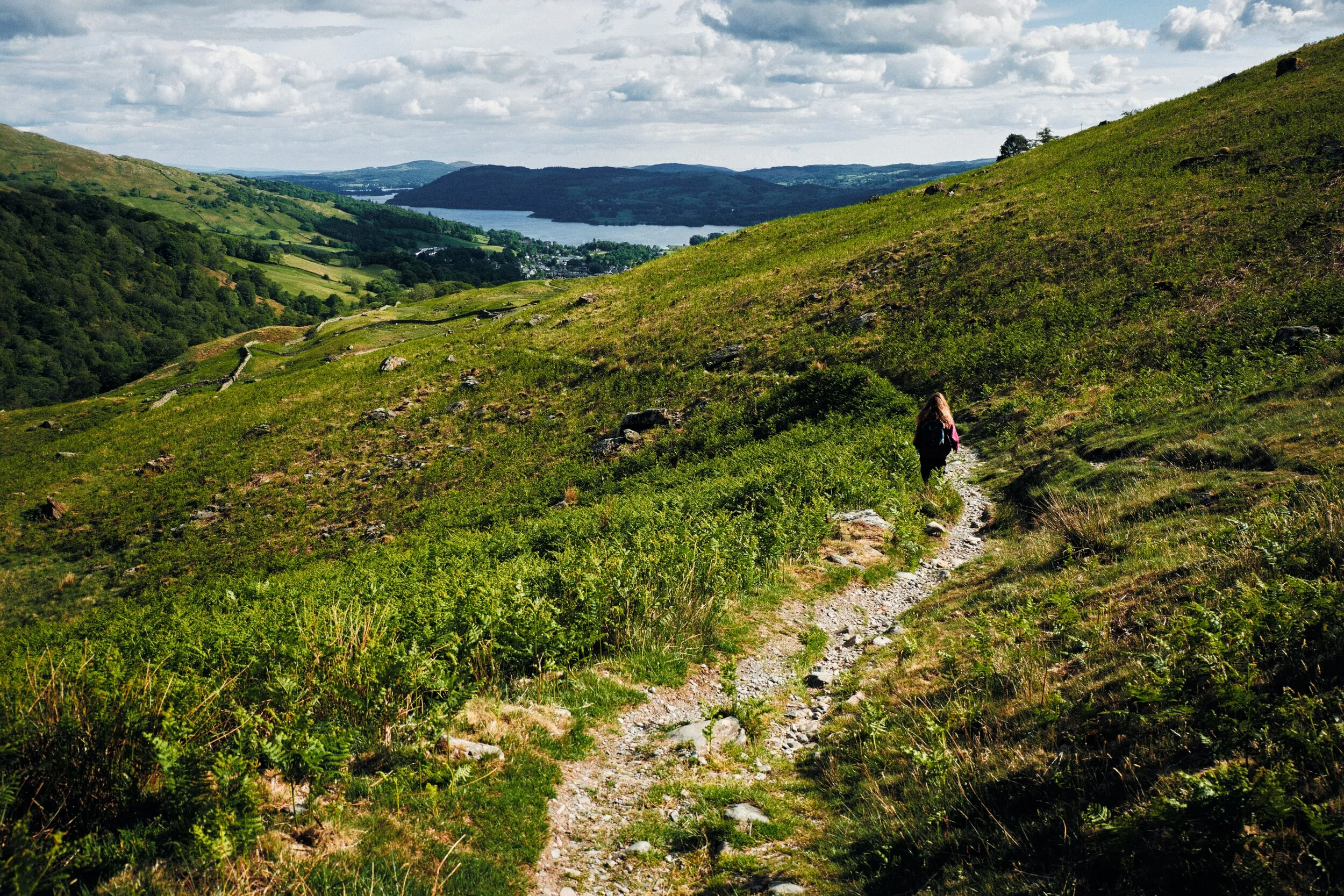  My lovely Lisabet leading the way back down Scandale&rsquo;s western shoulder, with England&rsquo;s largest lake Windermere in the distance. A glorious view. 