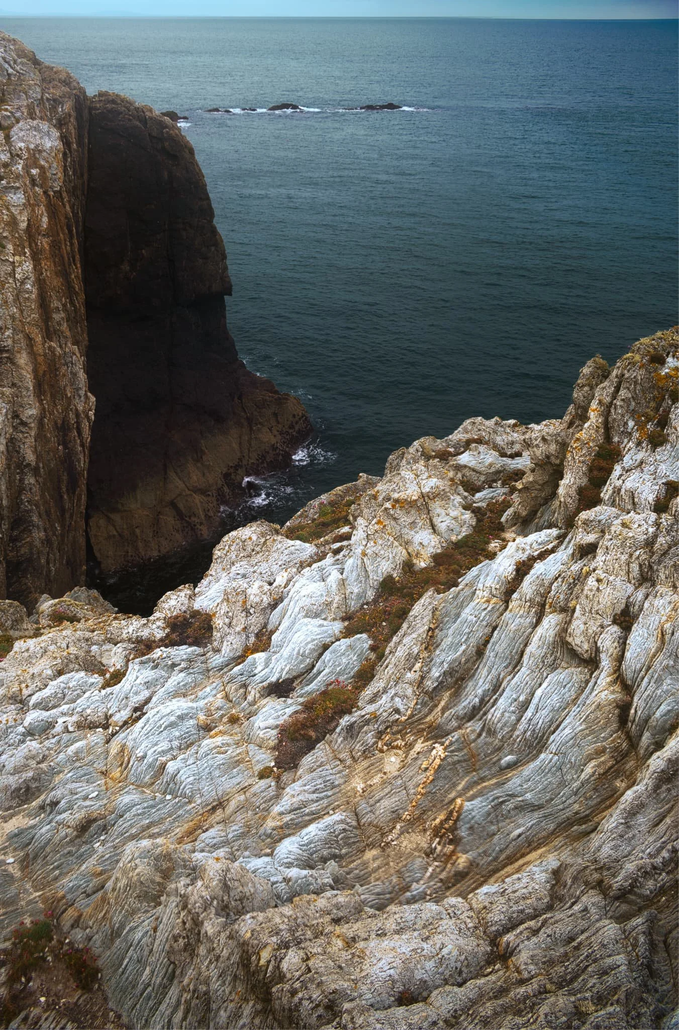  Rhoscolyn Head is known for its exposures of the South Stack formation of rocks. These are Cambro-Ordovician metasedimentary rocks, which demonstrate unusual foldings at certain places, such as here.  