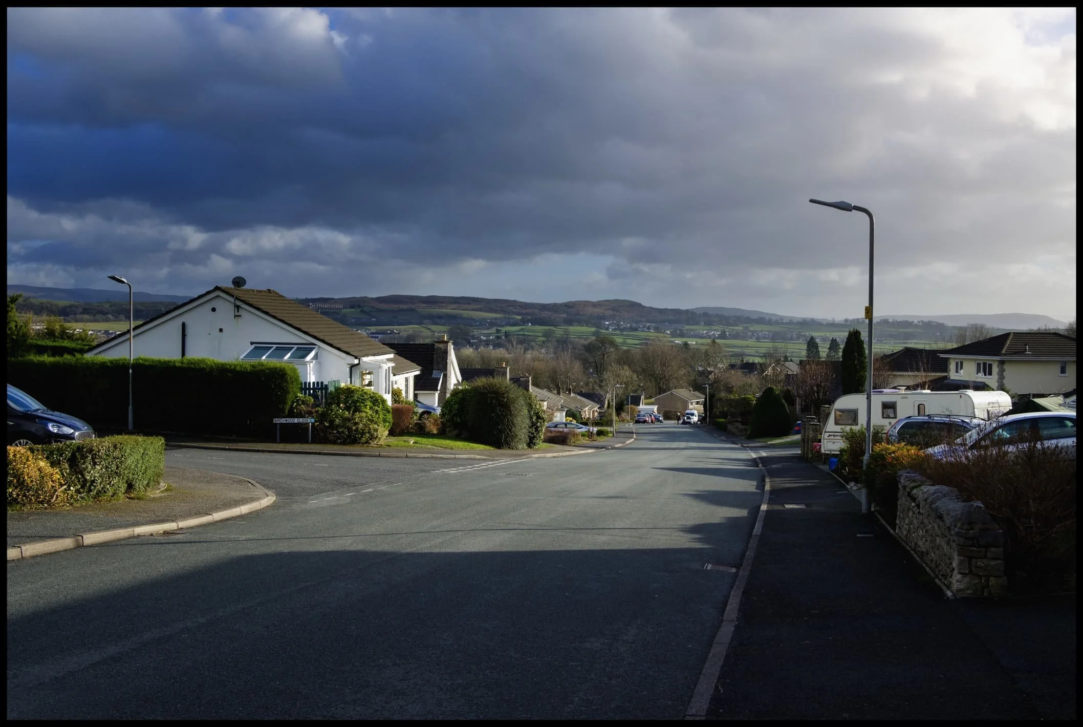  A picture of suburbia. The small knobby hill in the distance is The Helm. 