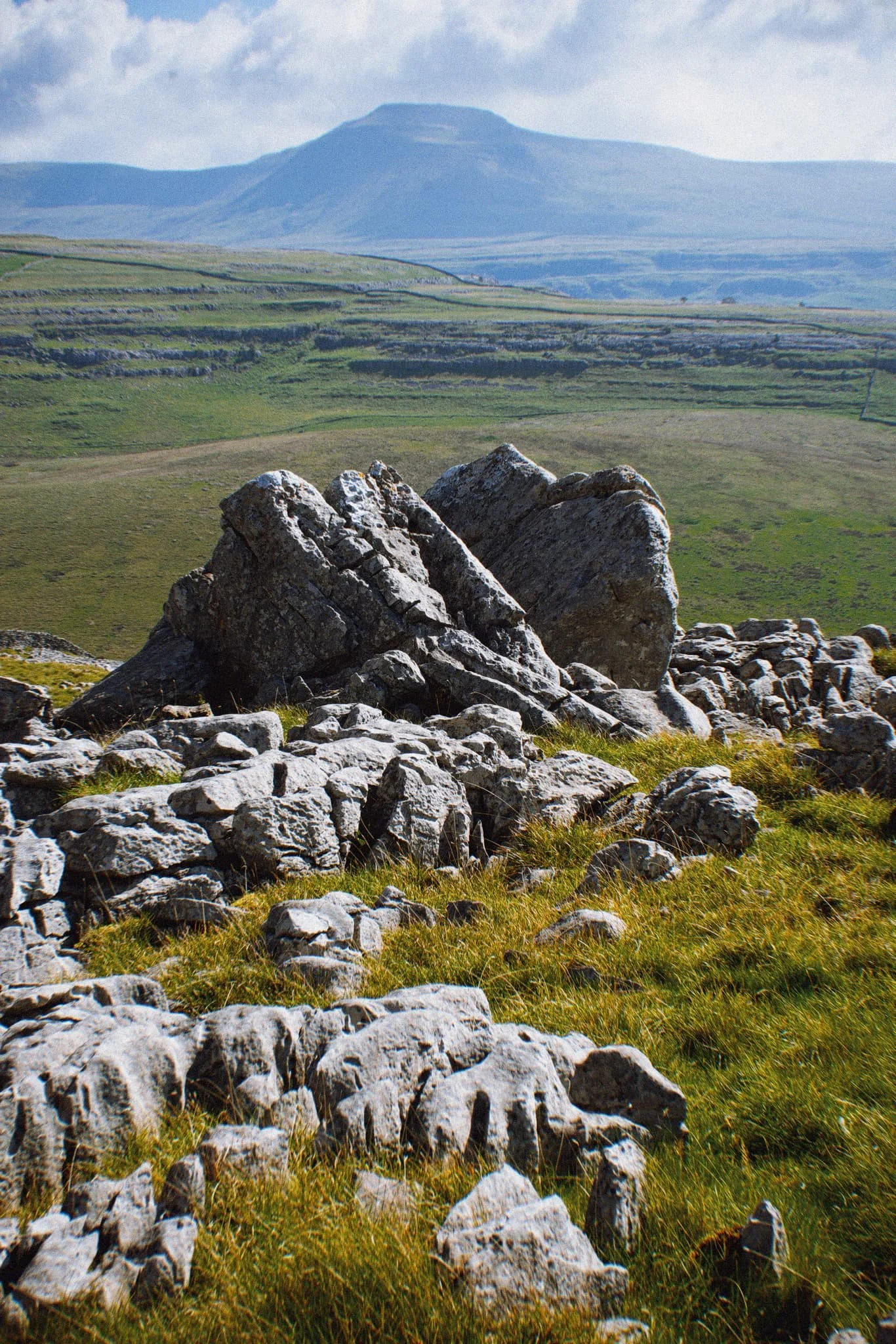  A large cluster of limestone boulders, no doubt dumped in position by the last Ice Age, provide a nice foreground focal point. They also, happily, seem to &ldquo;point&rdquo; towards Ingleborough. 
