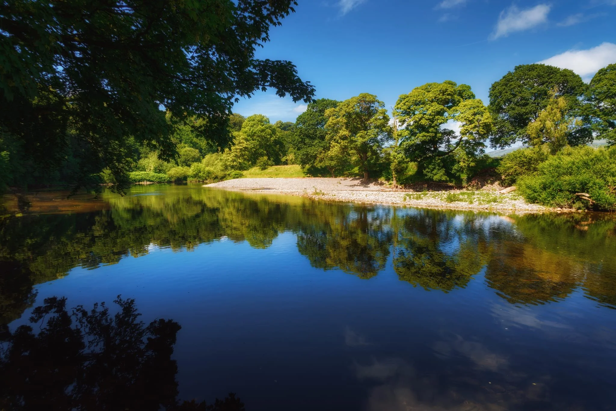  At the end of the riverside path before heading up the Radical Steps, glassy reflections in the Lune make me stop and nab a composition of this trio of trees. 