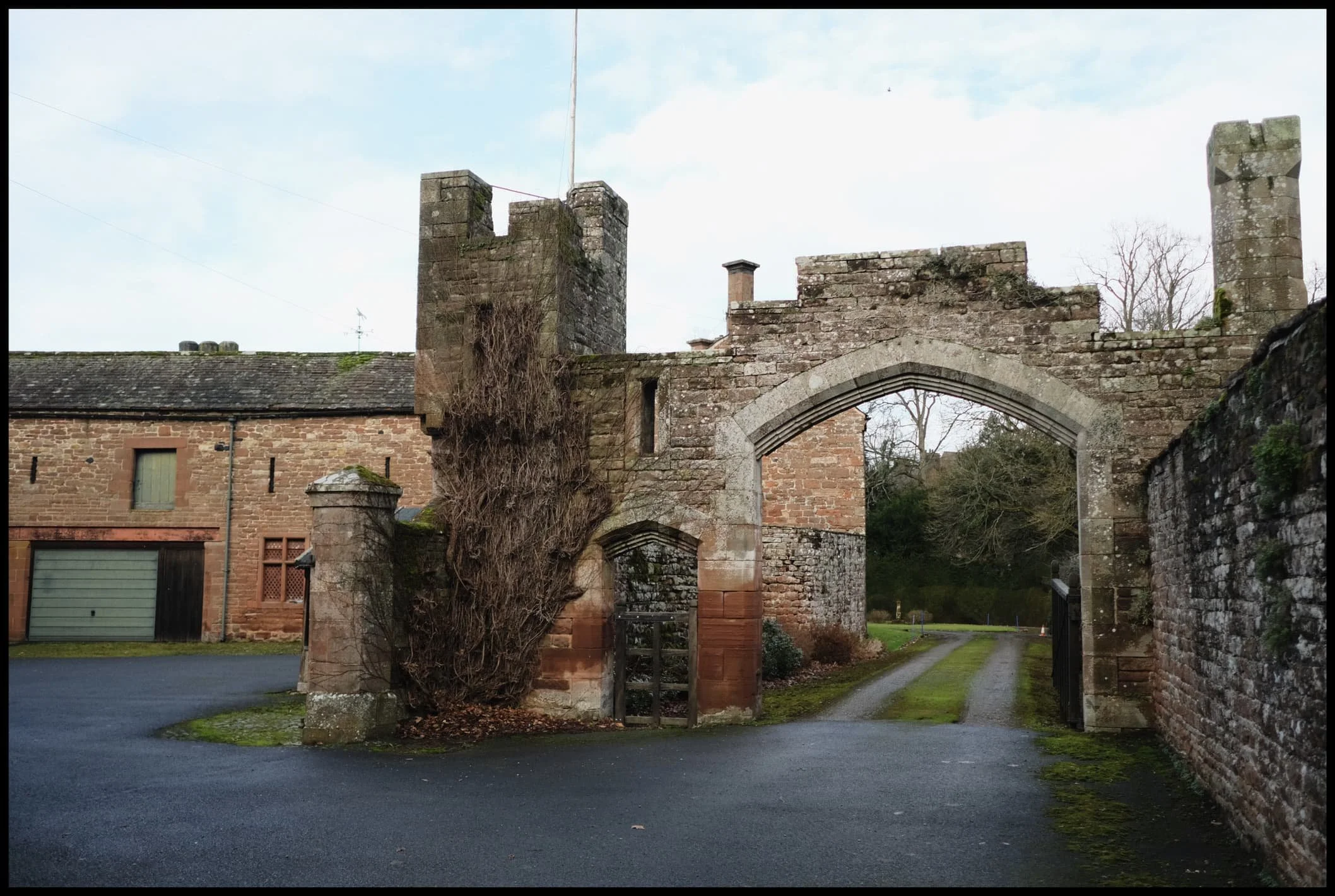  A rather grand entrance to an estate of some sort. 