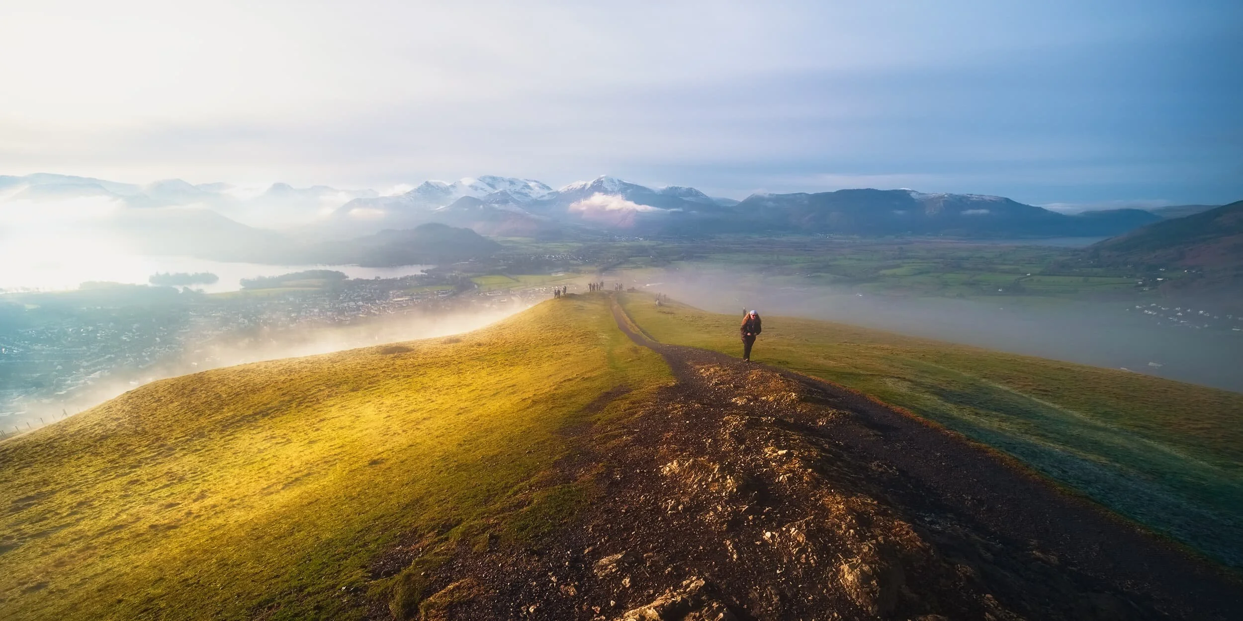 From the summit of Latrigg, looking back towards the Derwentwater and Whinlatter fells as another patch of mist slowly creeps up the shoulders of the fell.