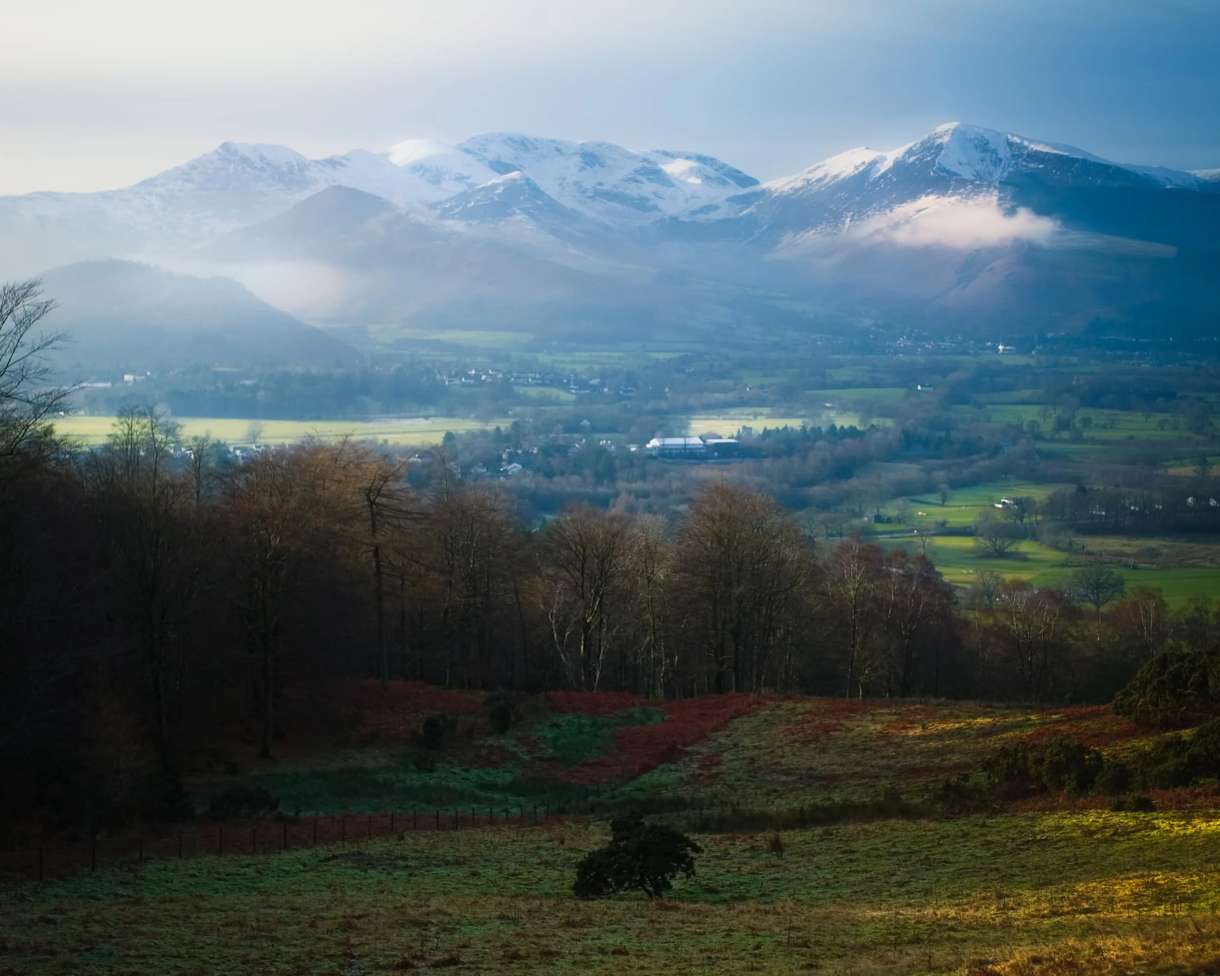 As we ascended up the steep section of the Cumbria Way, the views looking back west and southwest grew more impossible to resist photographing. The sun was too weak to burn away the morning’s temperature inversion, leaving floating tufts of mist to meander around the fells.