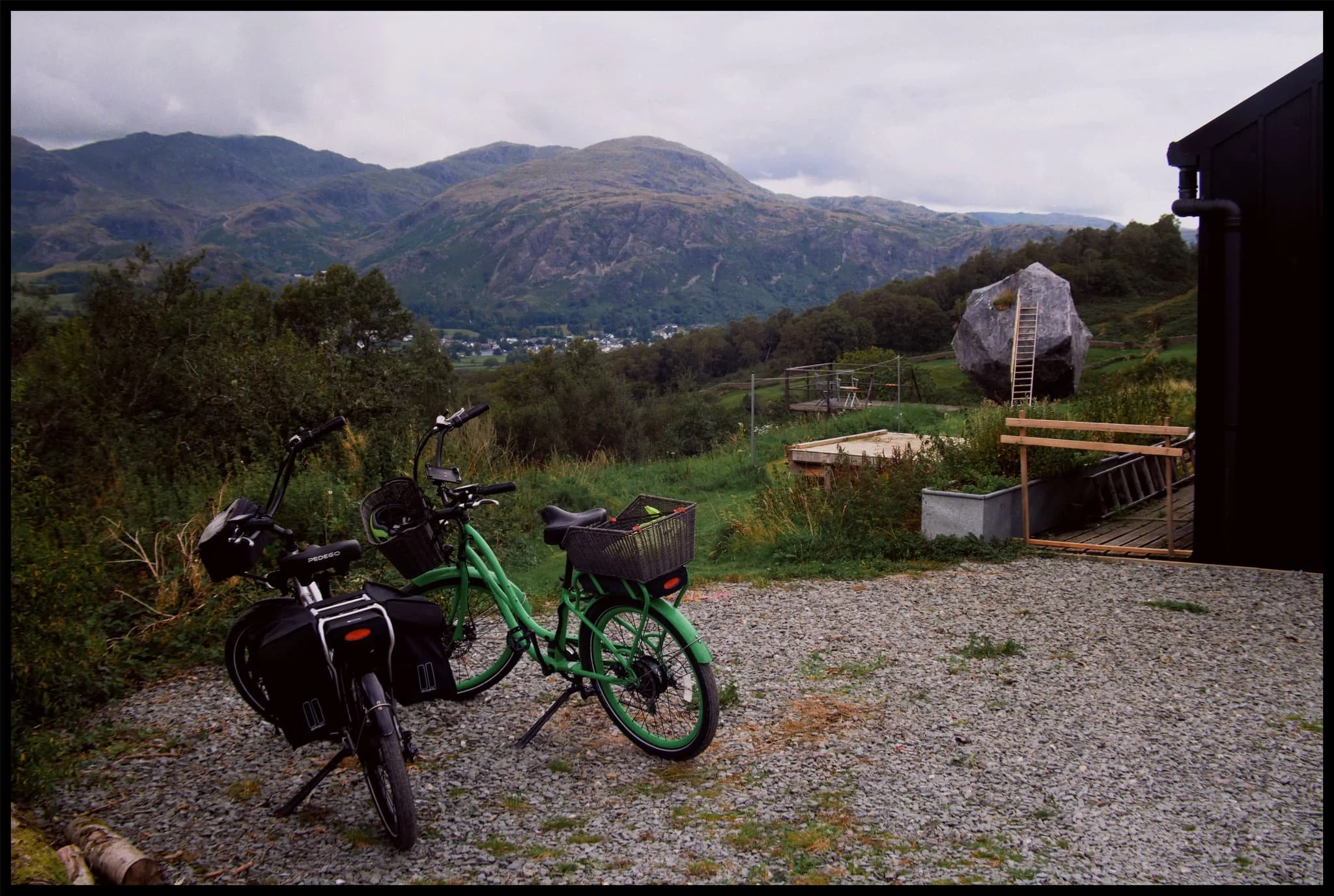  Lawson Park&rsquo;s vantage point is sensational, here picturing Yew Pike above Coniston village. To the right, an arts sculpture known as  The Err , reminiscent of the Bowderstone above Borrowdale. 