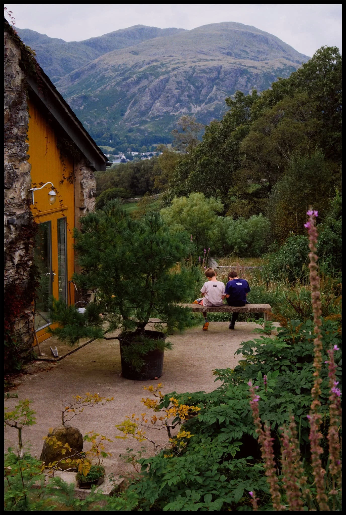  Two young lads make drawings of the view before them. 