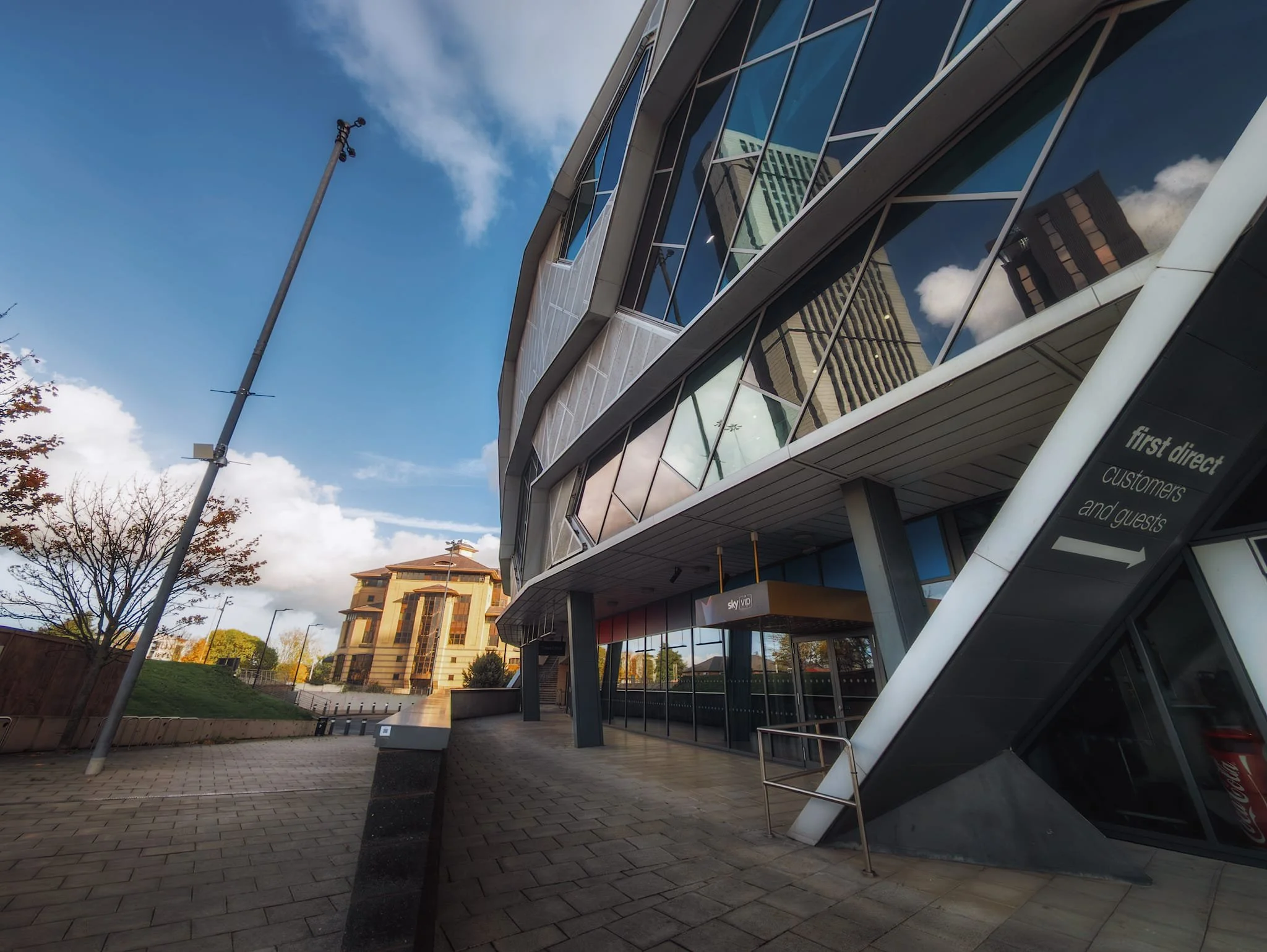 The Leeds Arena with the old HBOS Leeds building glowing gold in the distance. Leeds Arena was opened in 2013, designed with a striking honeycomb design based on cellular geometric patterns, visible from key approaches. The façade can change colour or pattern in the evening depending on the event. 