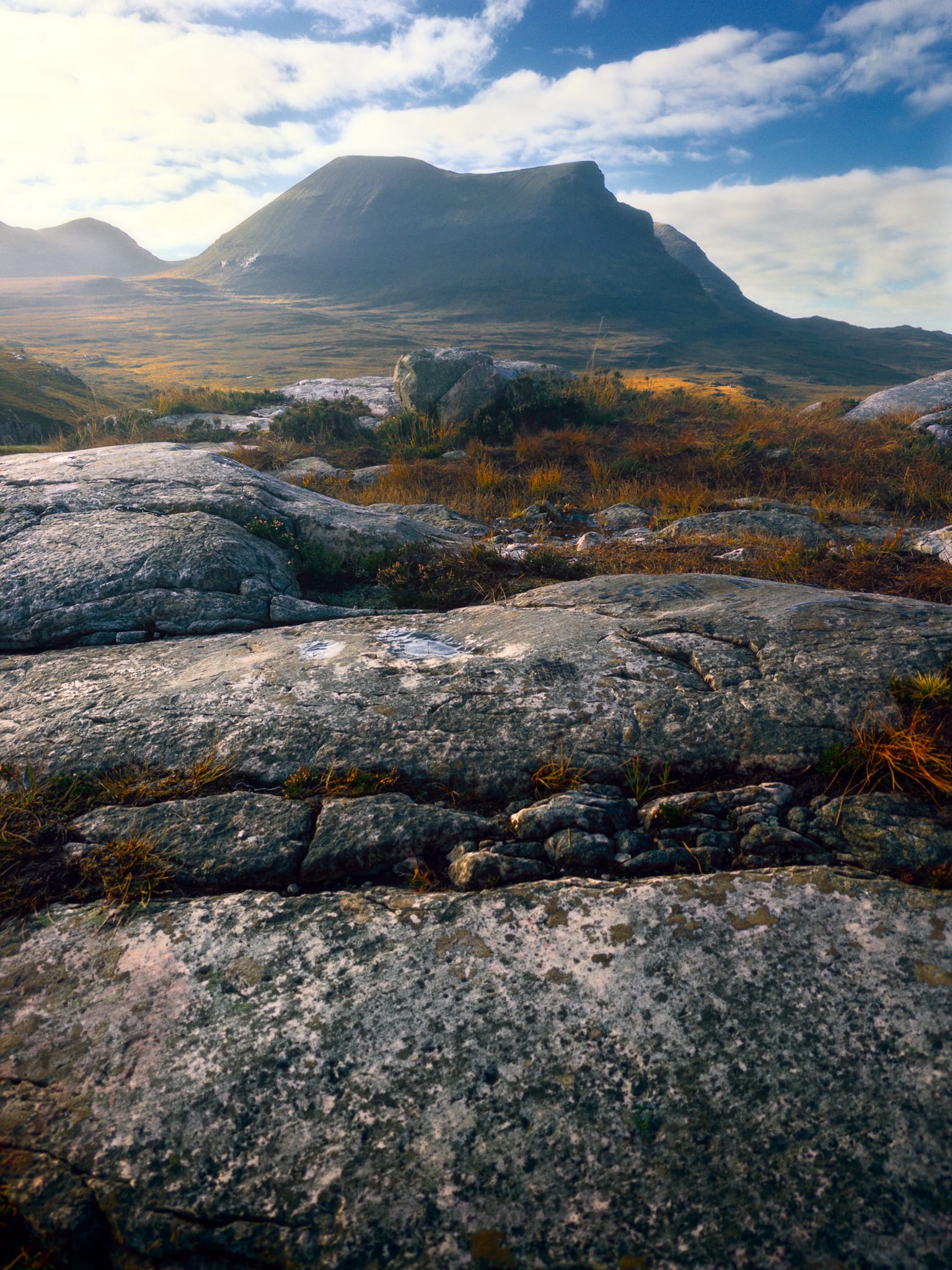 I hopped around the sandstone slabs for more compositions, finding this one looking west towards one of Quinag’s most well-known peaks, Sàil Gharbh.