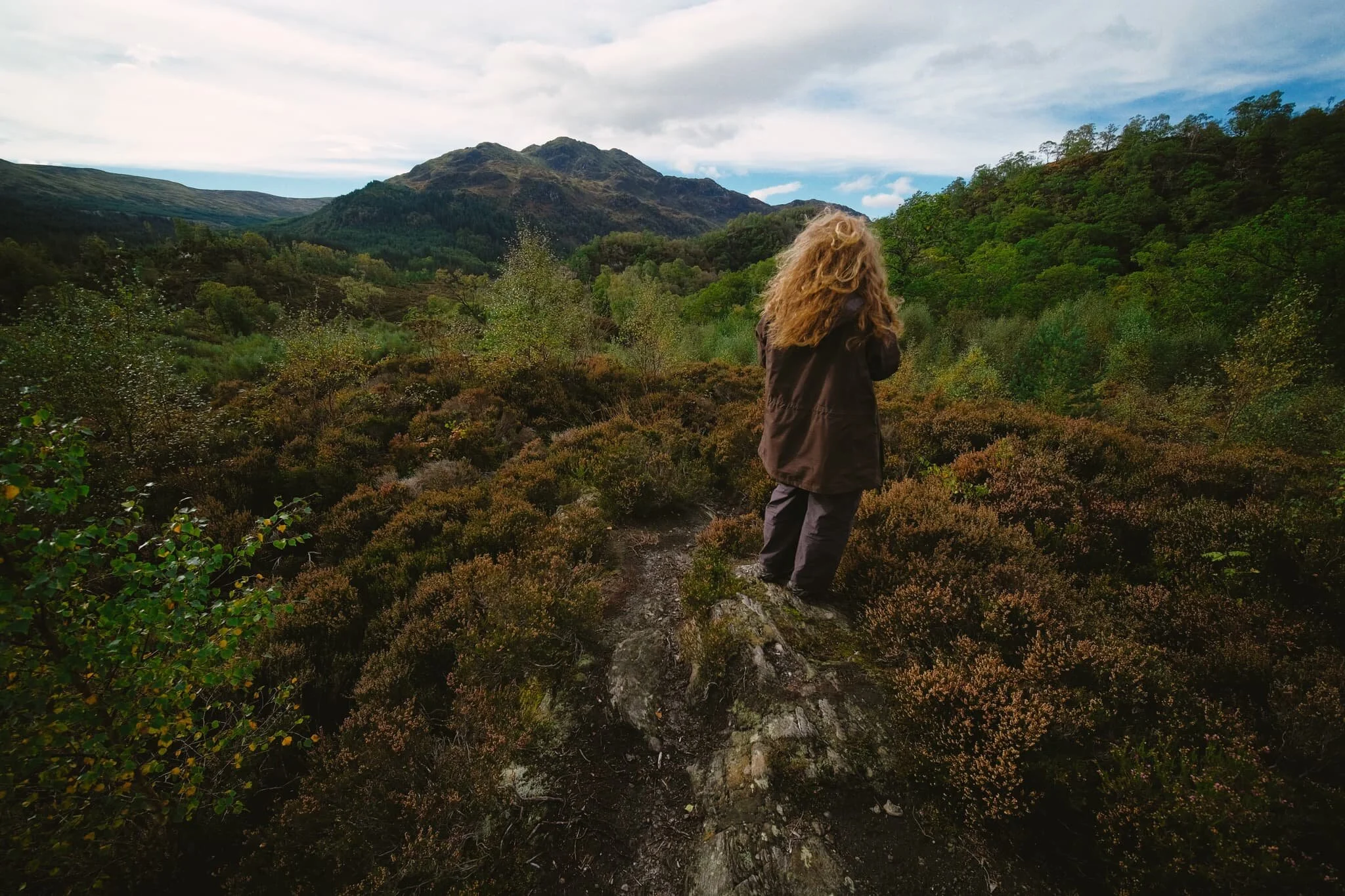  Looking southwest from the summit of  Creag Noran  to Ben Venue. Lisabet has the  perfect  hair for this kind of photo. 