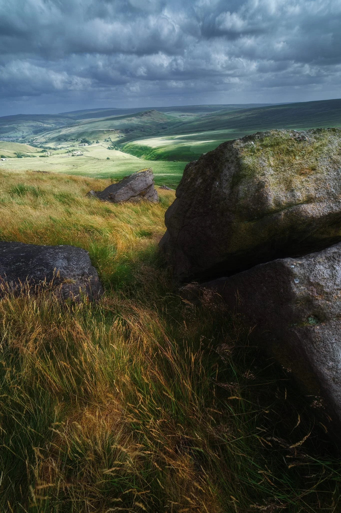 At 1,400 ft above sea level, the wind was blowing a raging storm. Probably one of the windiest shoots I’ve ever done. I wanted to capture that sense of rushing and movement everywhere, contrasted against the still and stubborn boulders and crags.