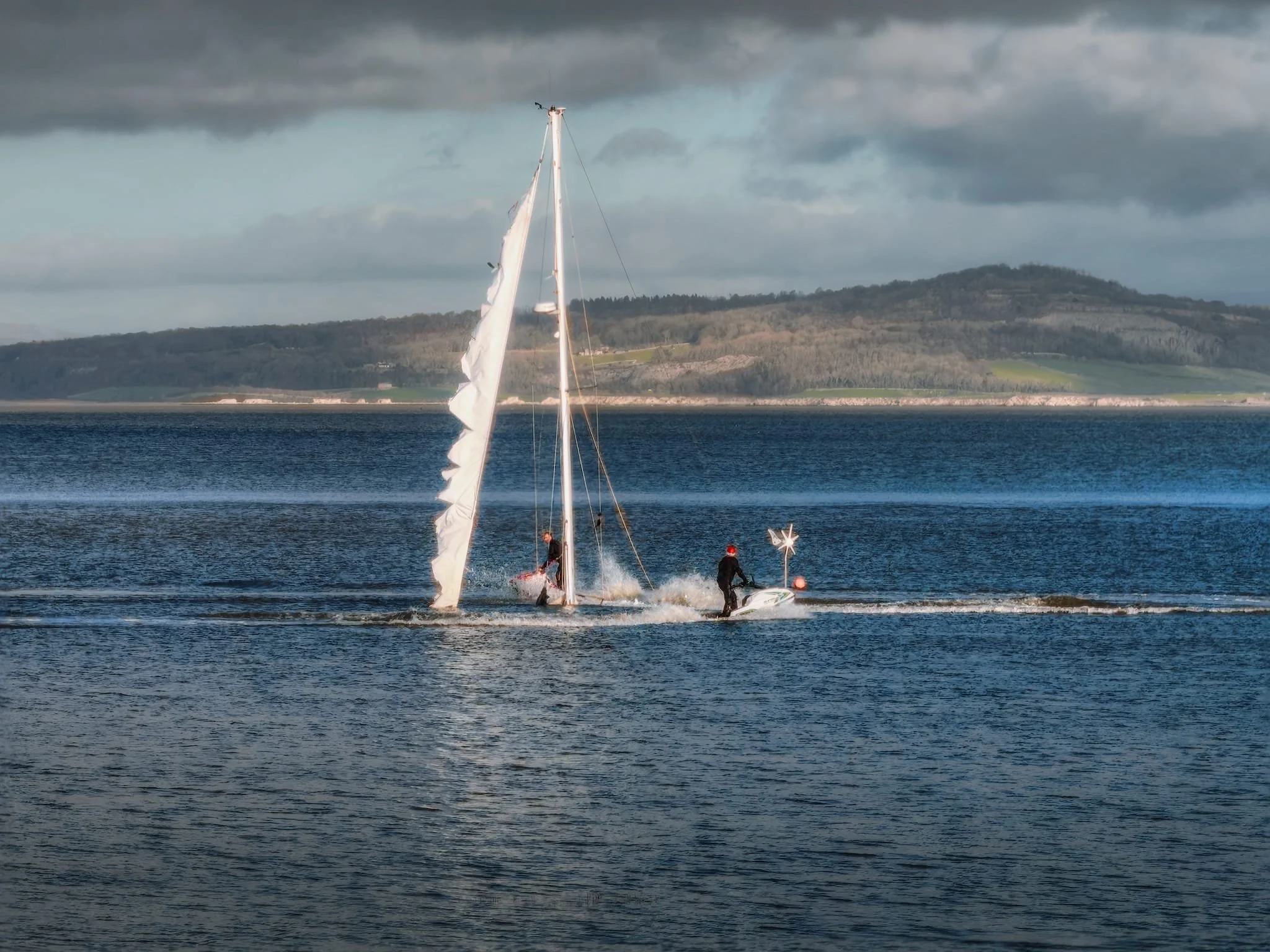  By the time we&rsquo;d arrived at Morecambe, high tide had just passed so there was still plenty of water in the bay. I spotted two people, one of whom was wearing a santa hat, on jet skis circulating around an abandoned and sunken boat. Never change, Morecambe. 