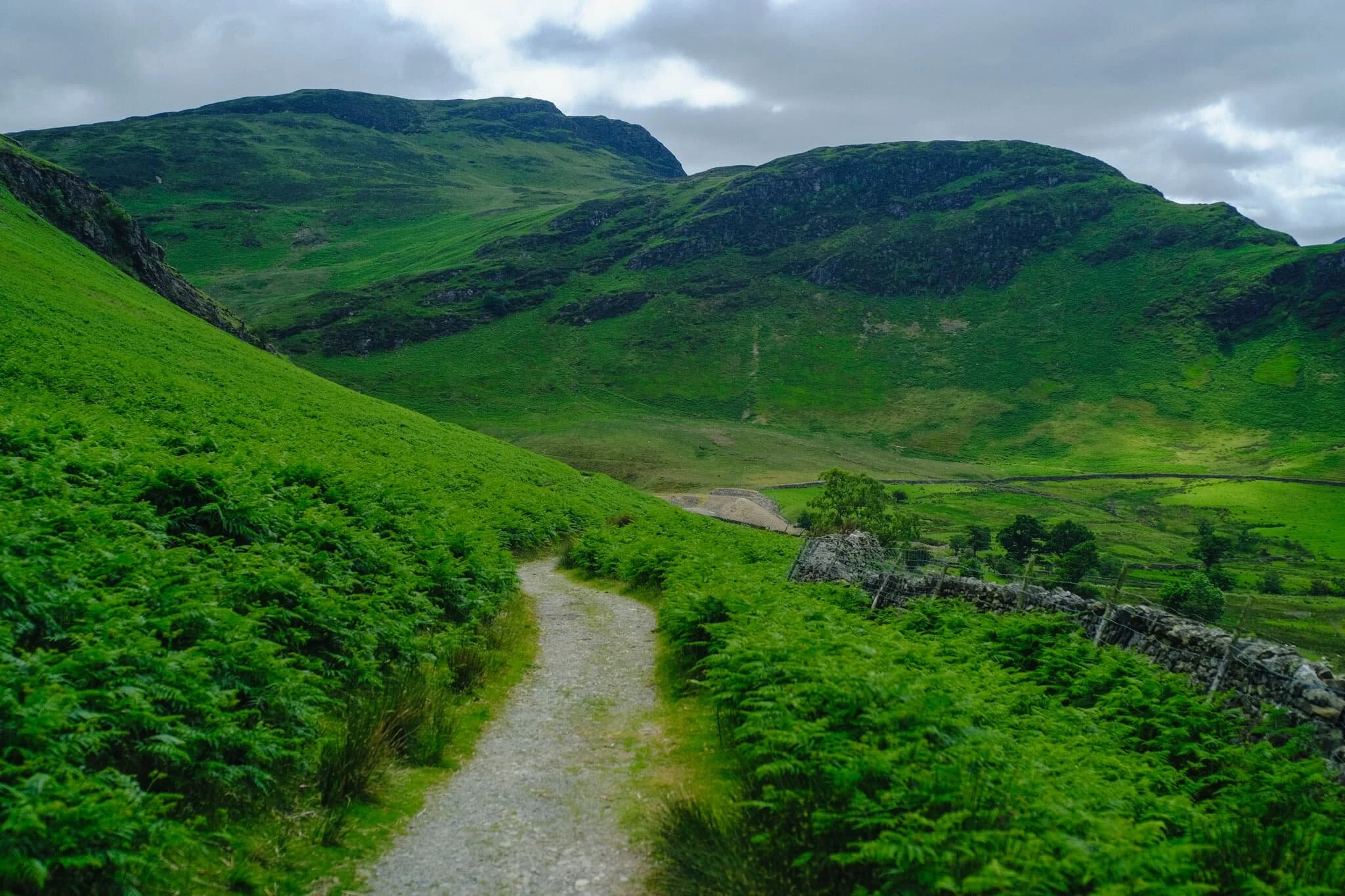  I suspect this minor road was once a  miner&rsquo;s  road (see what I did there?). According to the OS Map, ahead of us at Yewthwaite was some disused old mining works beneath Maiden Moor (576 m/1,890 ft). 