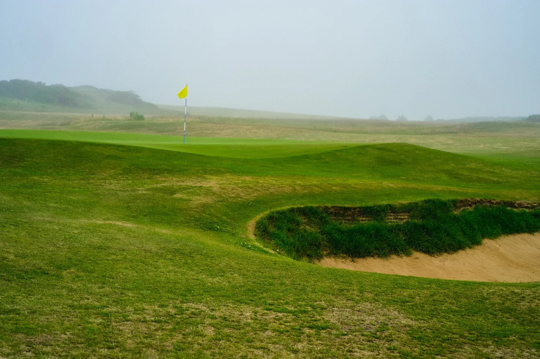  Alas, no castle could be seen. The haar had covered the whole Northumberland coastline in a thick fog. Nevertheless, to get to Embleton Bay and the trail from Embleton Village, you have to pass through Dunstanburgh Castle Golf Club. There&rsquo;s a lot of golf around the Northumberland coast. 