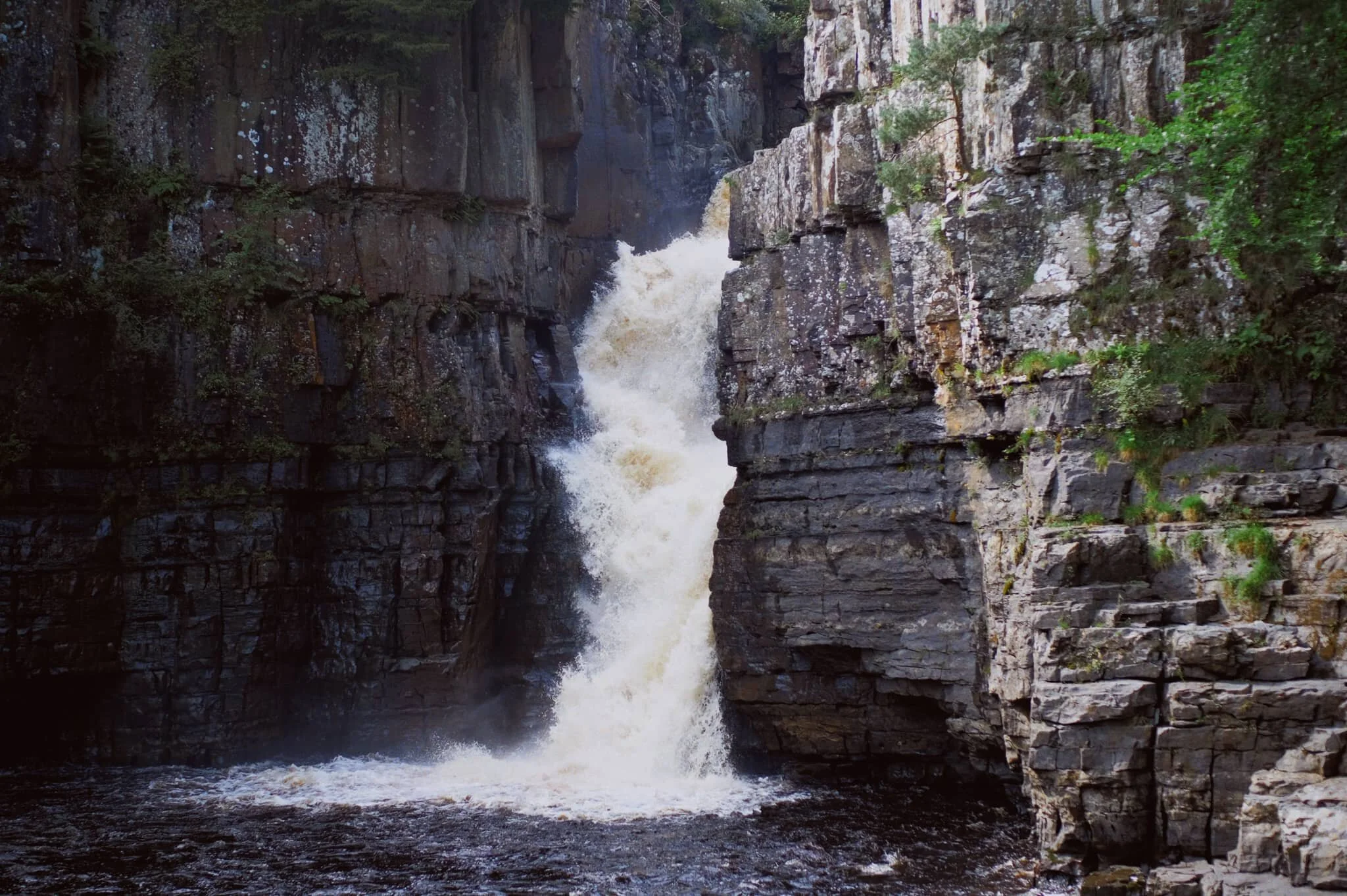 And there she is, plunging 70 ft off a cliff into the deep pool below. What a sight.