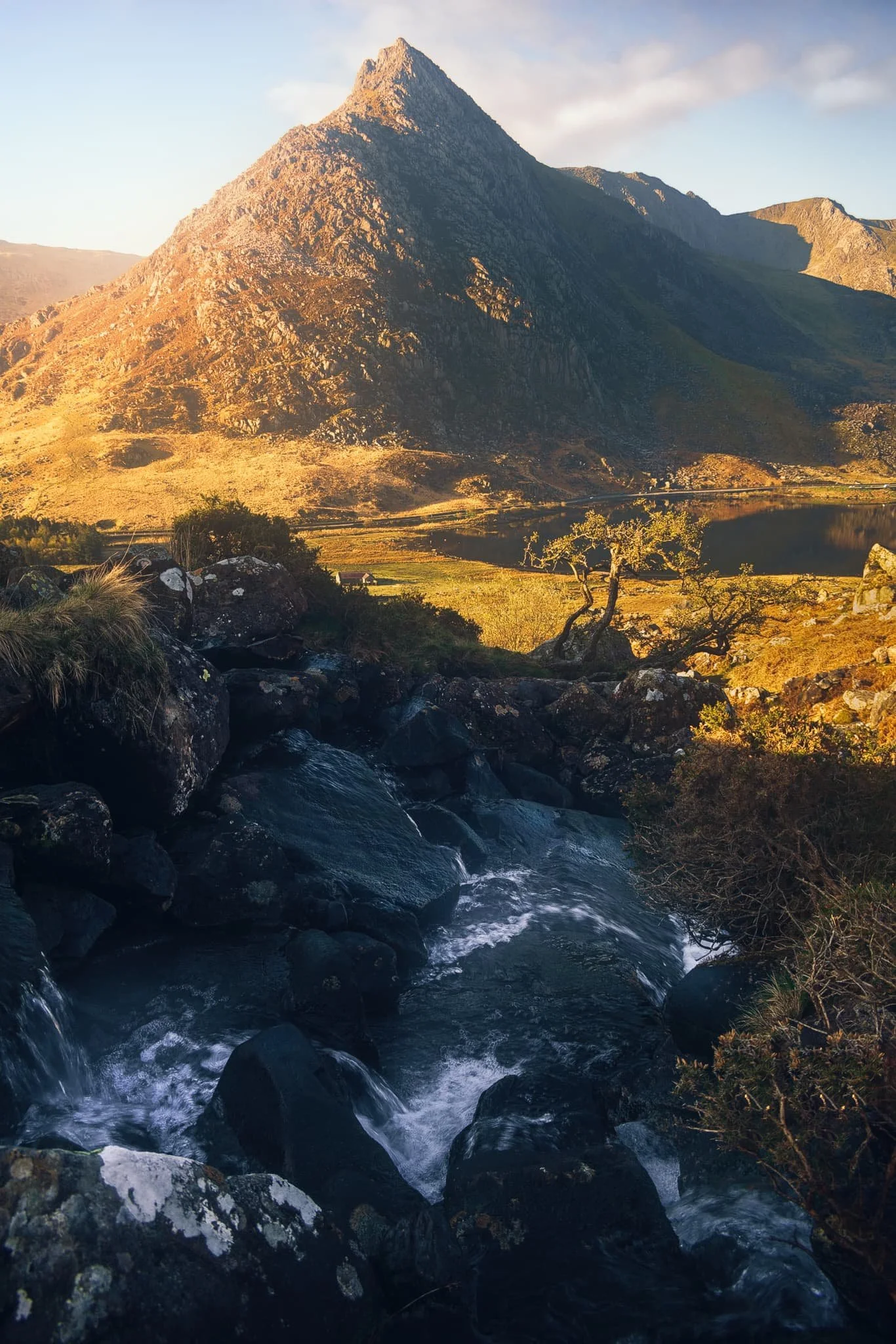  I finally got the composition of Tryfan I&rsquo;ve been after for  years . Tryfan at sunrise, with the cascades of Afon Lloer leading the way down the flanks of Pen yr Ole Wen. 
