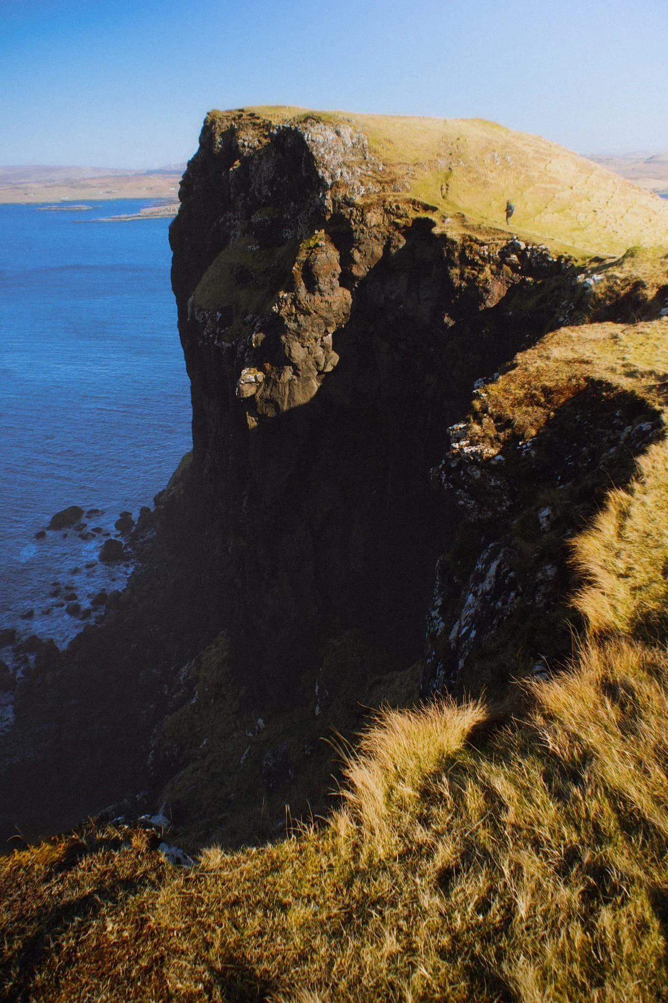 My little Lisabet hiking her way up to the next cliff, whilst I shuffled as close as I dared to the precipitous edge for this monstrous view.