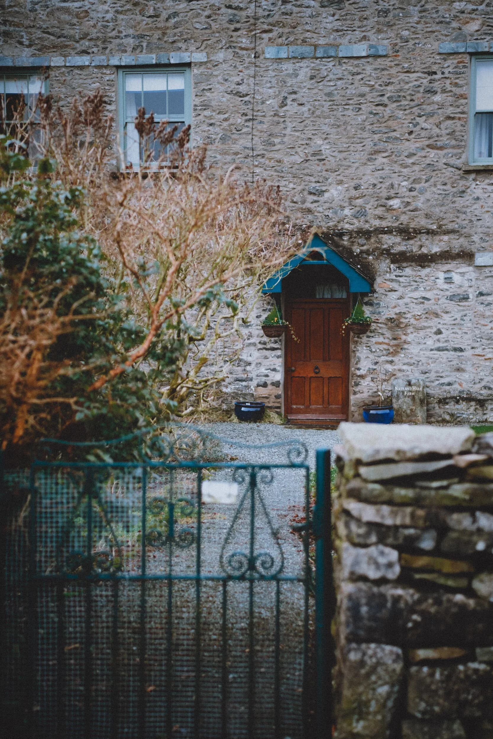 Arriving at Natland we slowed down for photos of the idyllic village and its old buildings. This big old building was once Natland Hall Farm, a relatively large farmhouse.