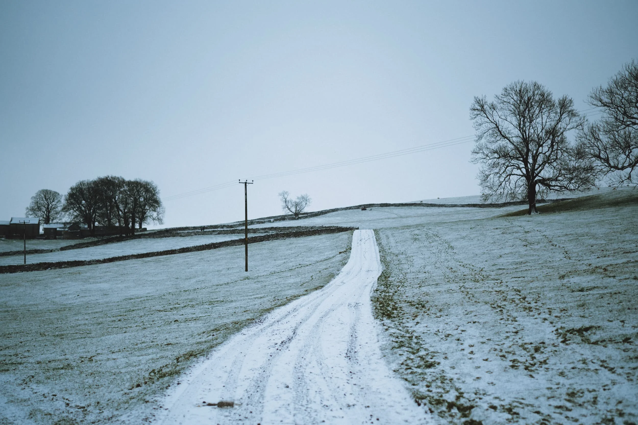 The lonely track towards High Helsfell Farm.
