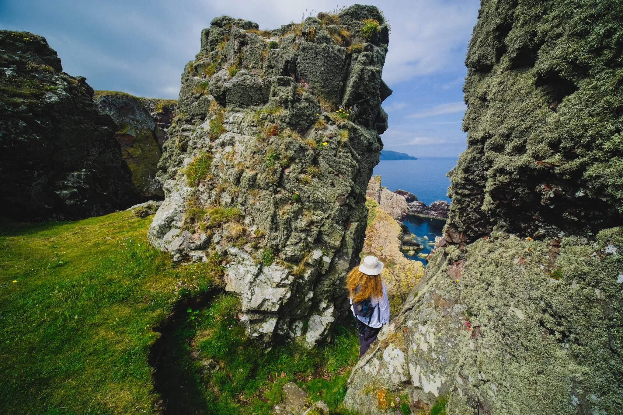  The cliff edges here get more erratic, now featuring individual towers and pillars that provide small openings and sheer drops to the sea below. 