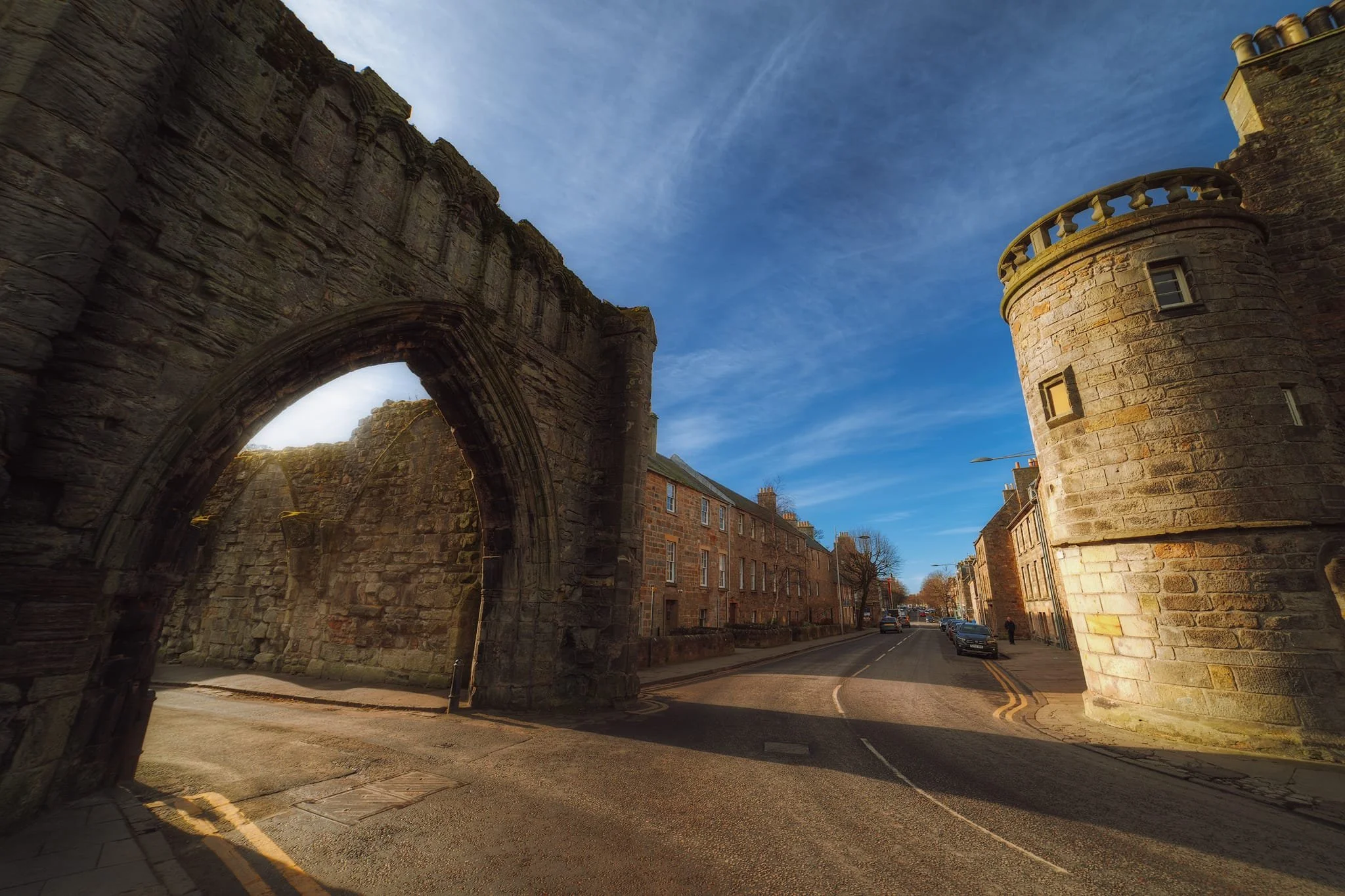  A gatehouse known as &ldquo;the Pends&rdquo;, a mid-1300s large stone gatehouse of the Augustinian cathedral-priory of St Andrews. Now a roofless shell with a large entrance. To the right is The Roundel of South Street. 
