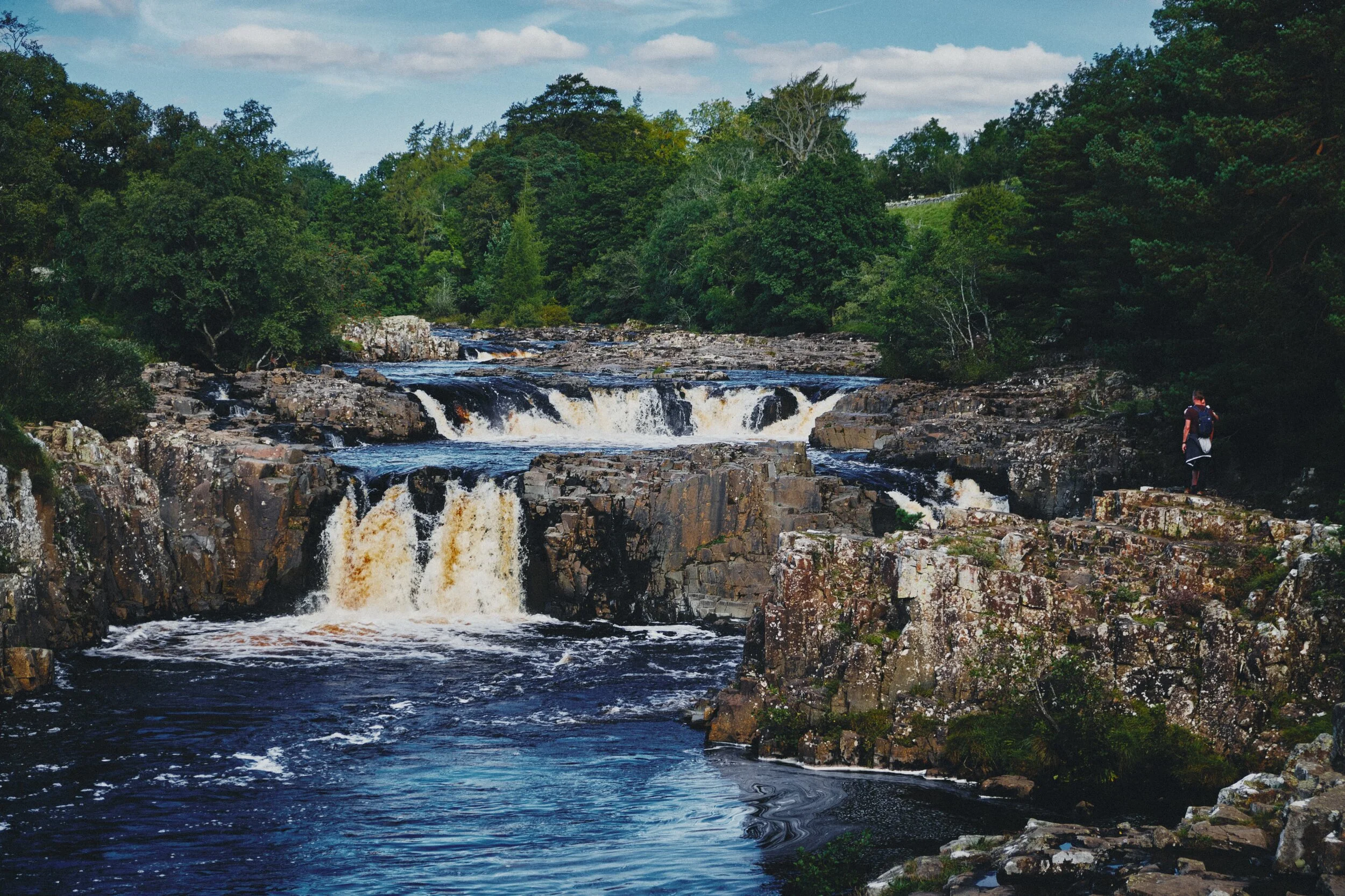After trekking back to the Visitor Centre, then across the road and down into the woods, the canopy opens up and we are treated to the spectacular site of Low Force.