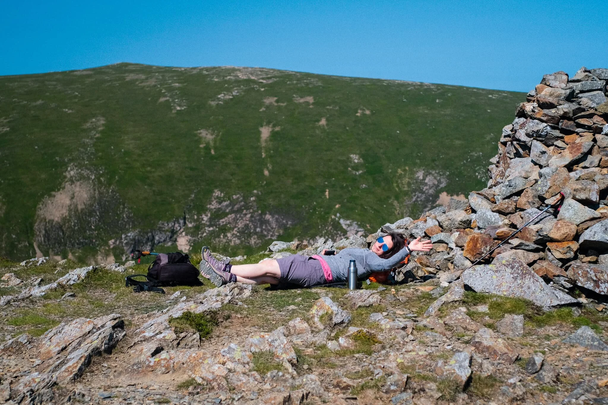 Kate happily resting by the wind shelter on Hindscarth. Across the valley is our next target, Robinson.