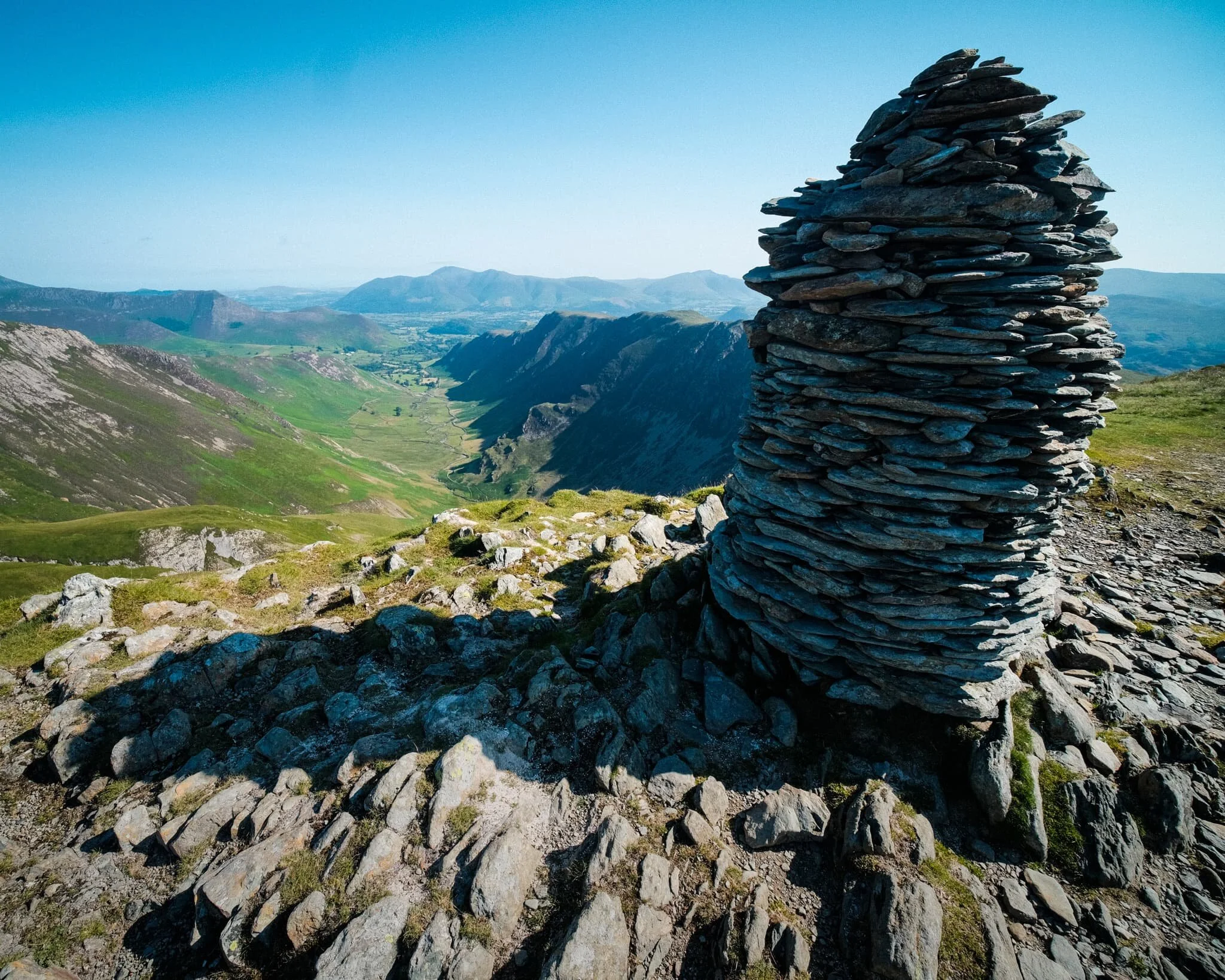 Aaaannddd… summit! The top of Dale Head, featuring its massive cairn and, more importantly, the ridiculous view if offers all the down the Newlands Valley towards the Skiddaw mountains. 8-years in waiting, and I loved every second.