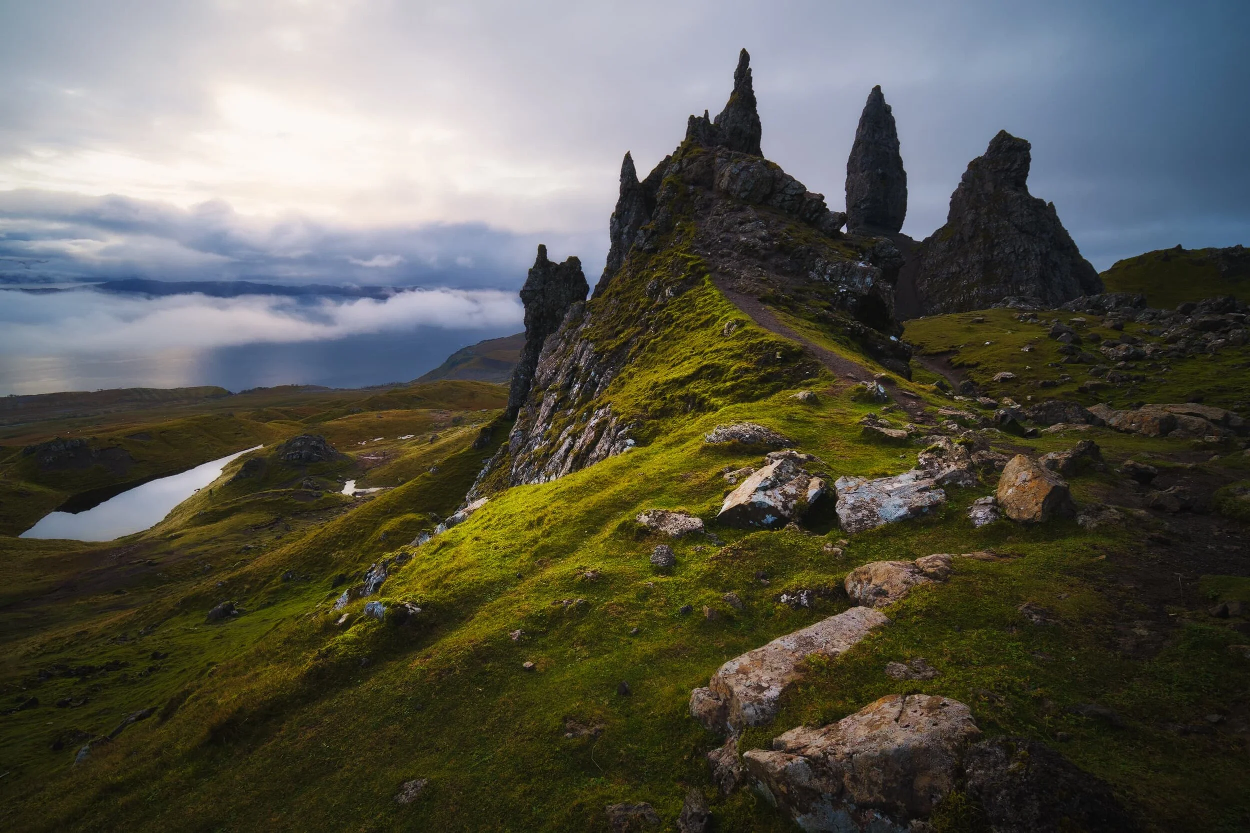  The more &ldquo;classic&rdquo; or &ldquo;traditional&rdquo; view of the Sanctuary rocks below the cliffs of the Storr. The temperature inversion was thickening up, along with the cloud cover, but a bit of sunrise light broke through to illuminate the scene. 