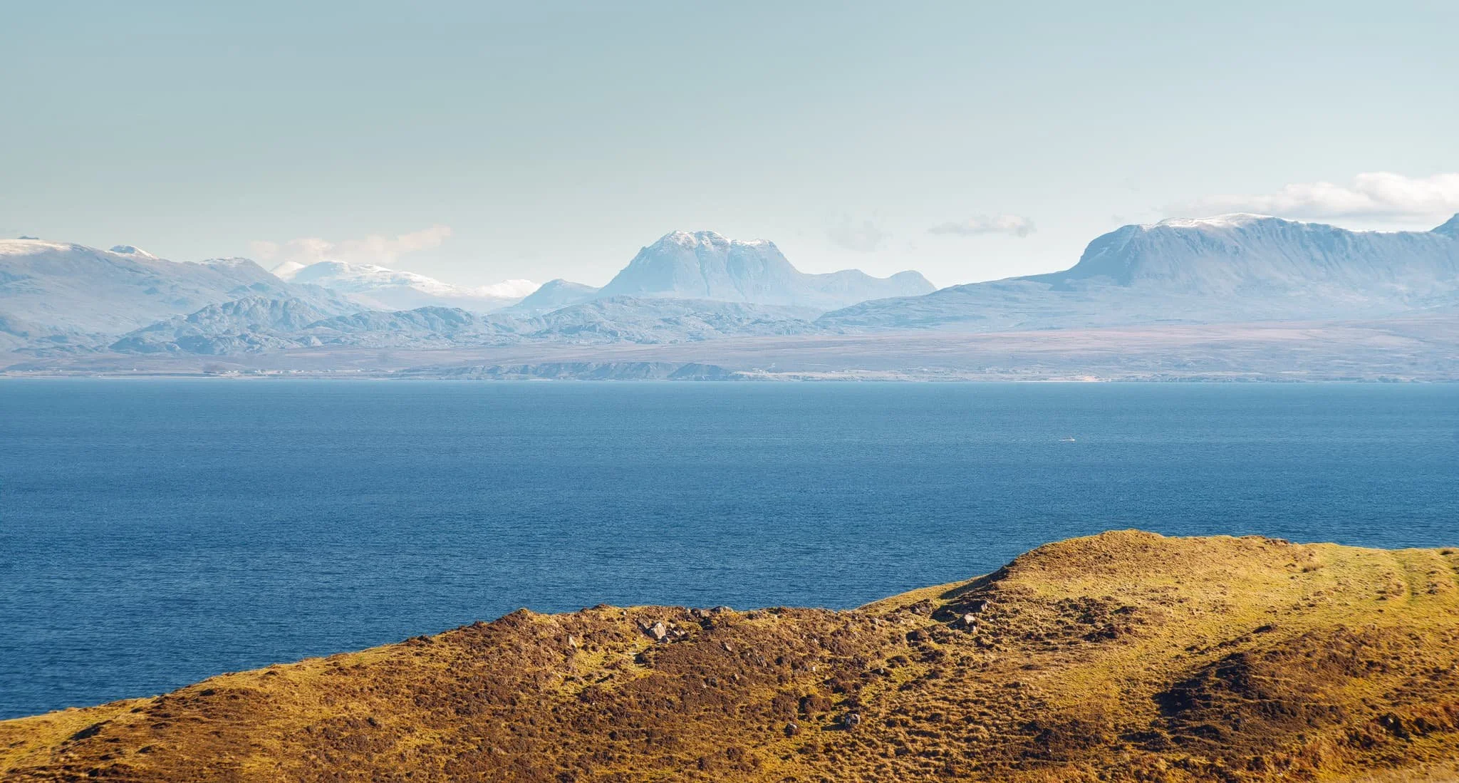 Further along the mainland, the unmistakable shape of Slioch (“the spear”), above Loch Maree, is immediately apparent, standing 3,219 ft above the sea.