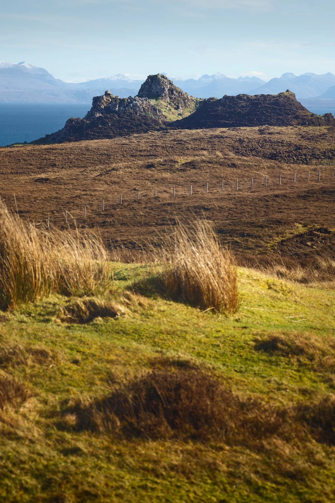 From Flodigarry, above Loch Langaig, a small ruin made for a nice composition, mimicking the shape of the distant mountains.