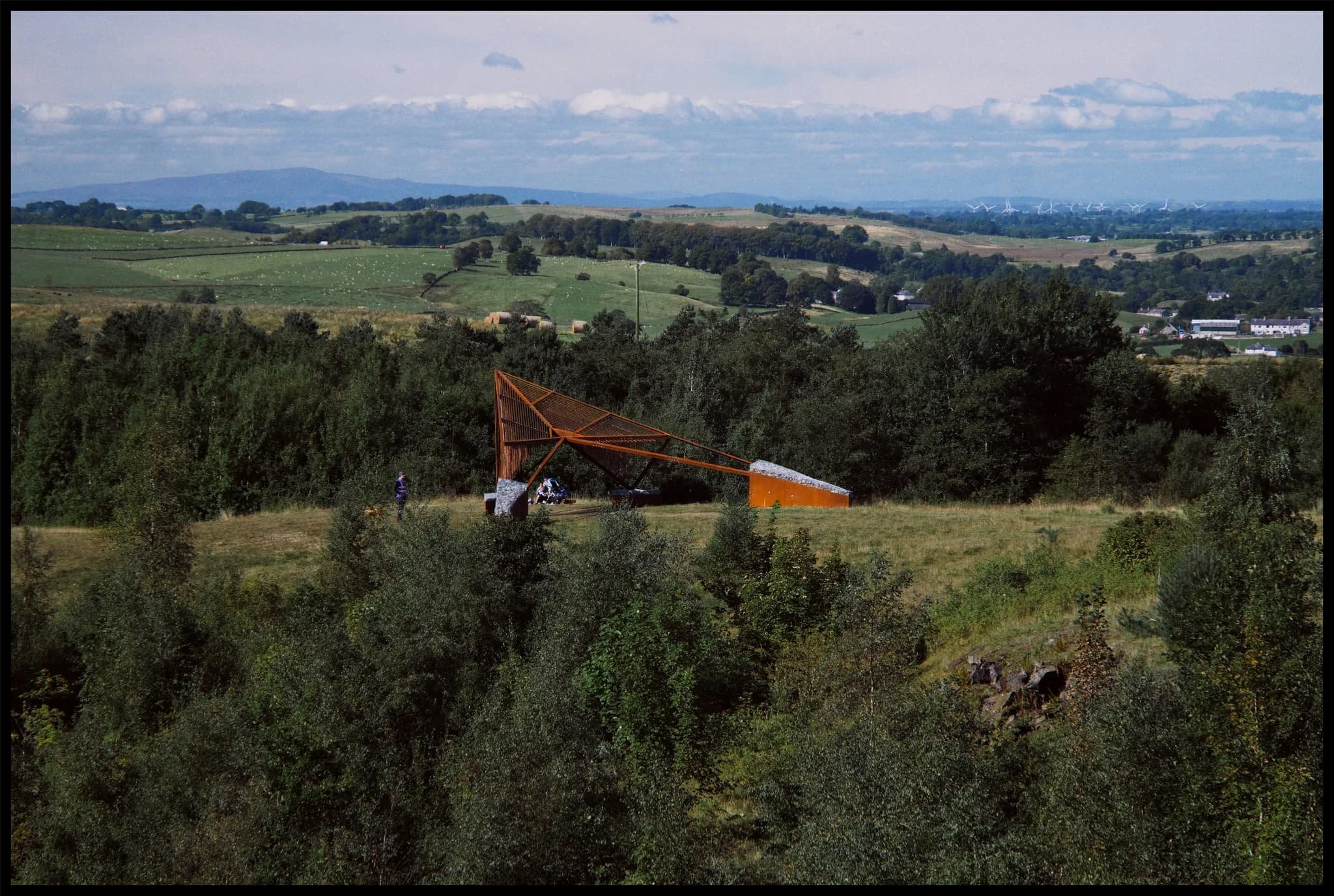  APERTURA, in context of the landscape. It is situated on a small ridge where part of Hadrian&rsquo;s Wall is now missing. 