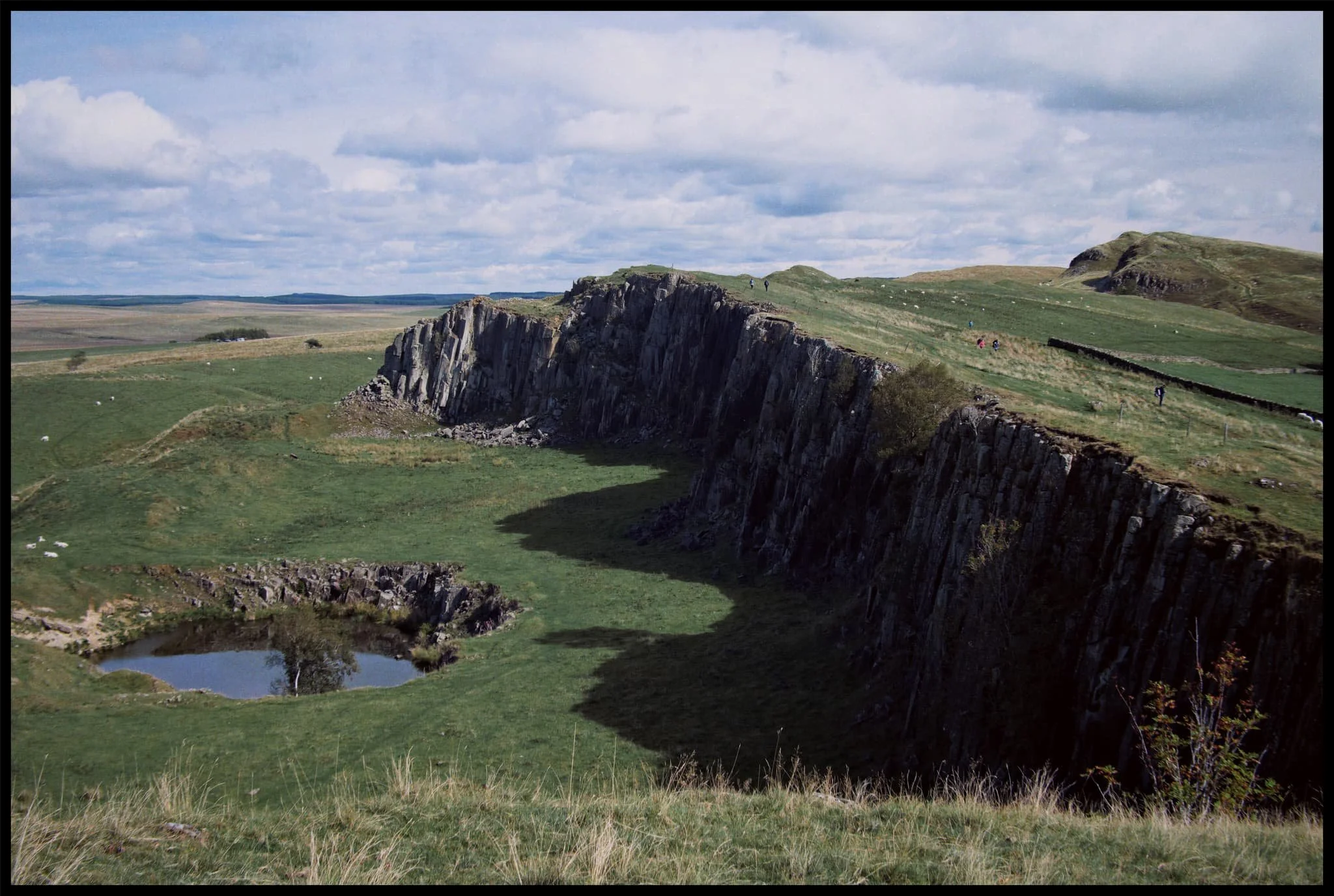  The Walltown Crags are volcanic in origin, made from hard dolerite and known as the Whin Sill. It&rsquo;s exactly the same rock and protrusion you see at  High Cup Nick ,  High Force, Low Force, and Cauldron Spout , and even as far as the Farne Islands in the North Sea.  Geology North  has a good map of where in North England the Whin Sill has surfaced above ground to create incredible landscapes. 