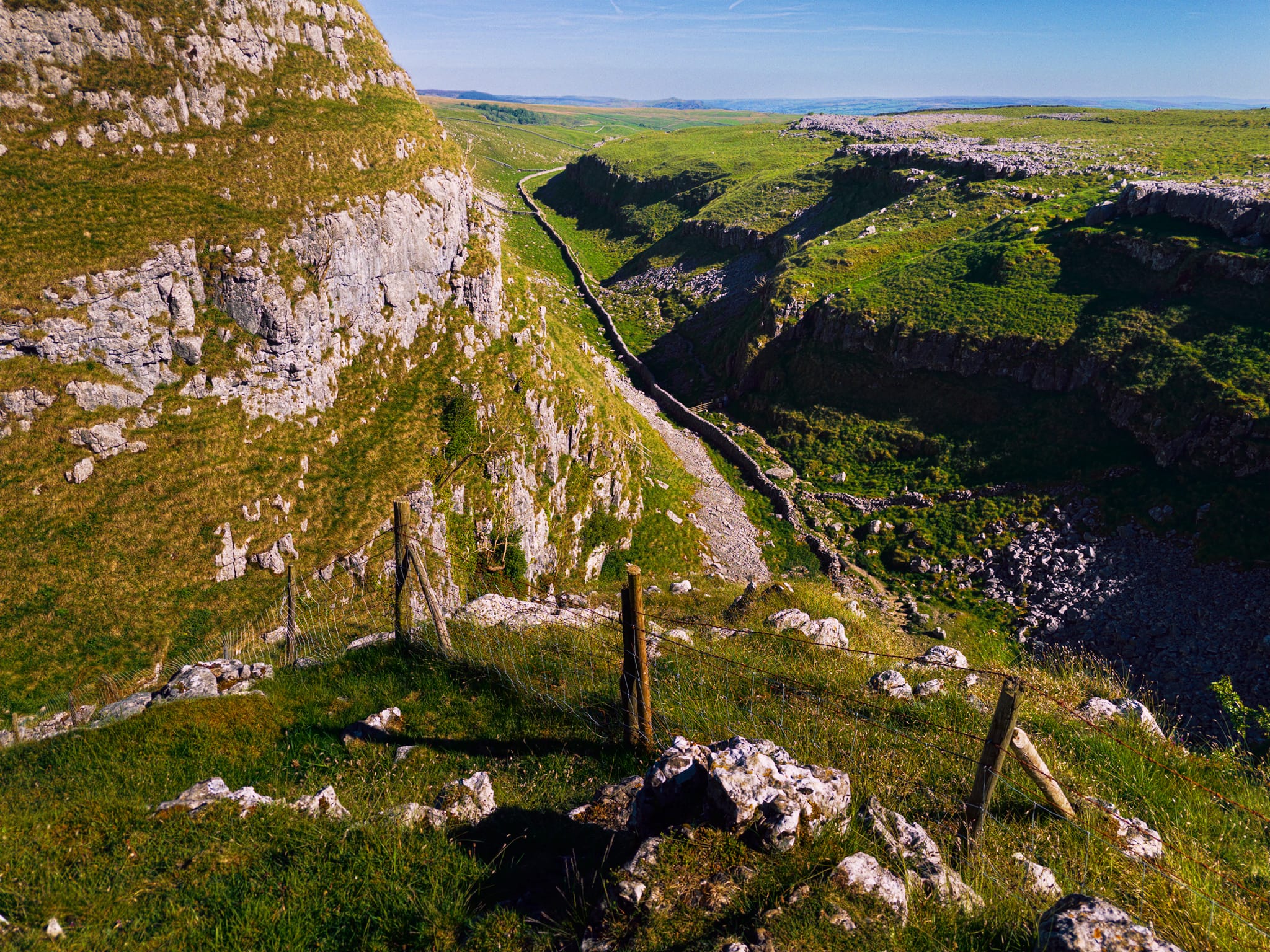 From the high crags, the course the ancient river took is evident, sloshing into the other side of the valley and gouging out a route south towards Malham Cove.