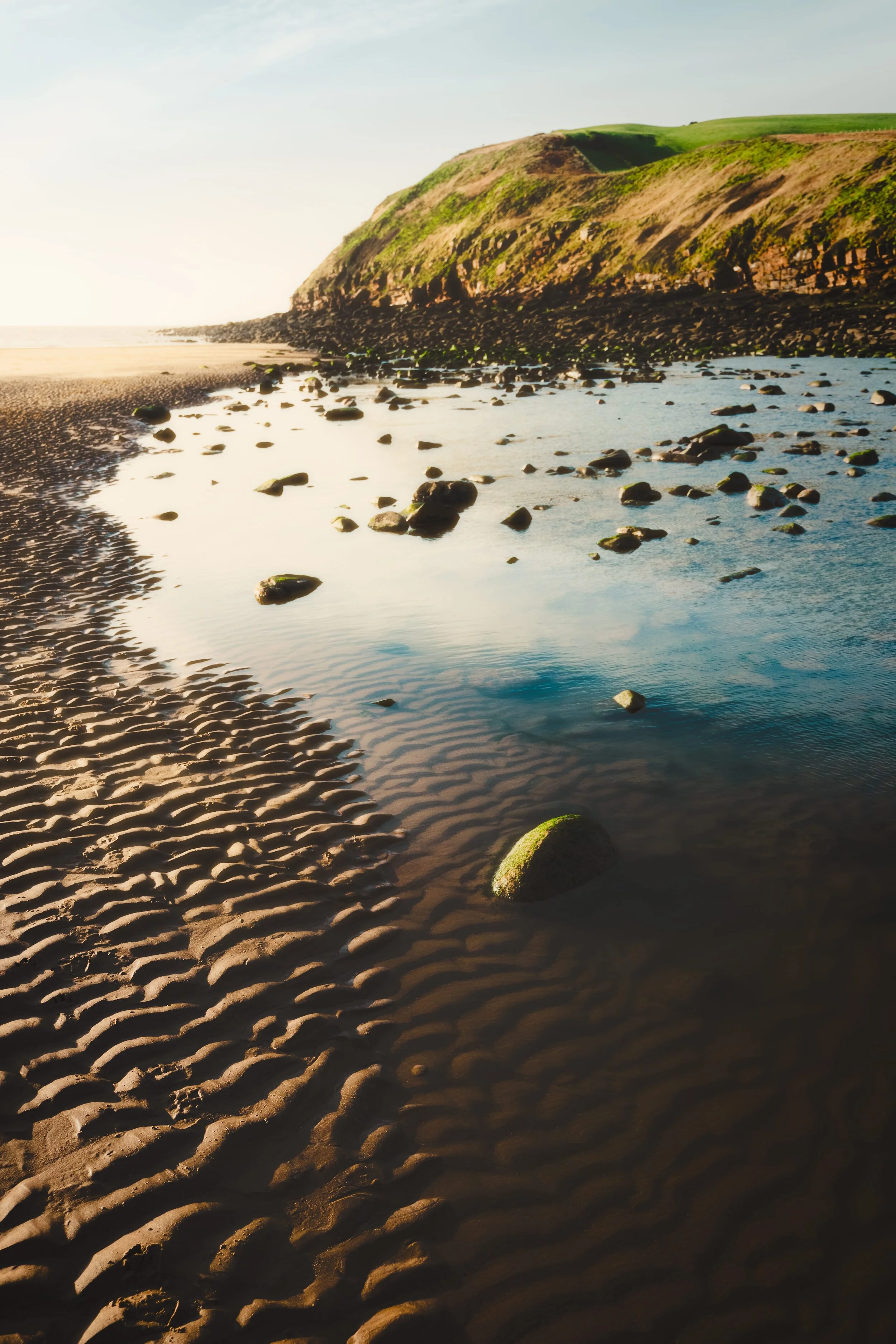  Gorgeous sunset light at St. Bees. I wanted to shoot this large rock pool as a leading line towards the South Head of St. Bees Head, capturing all that beautiful rippling sand detail. 